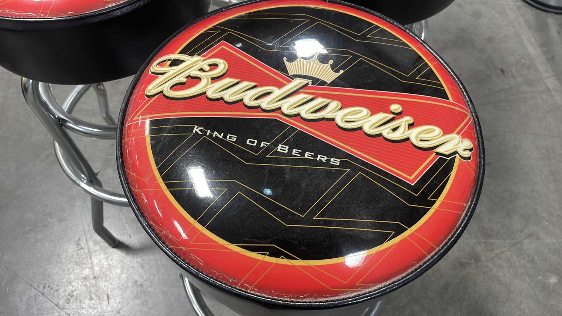 Photo 2 of BUDWEISER BAR TABLE 27” AND 3 BAR STOOLS