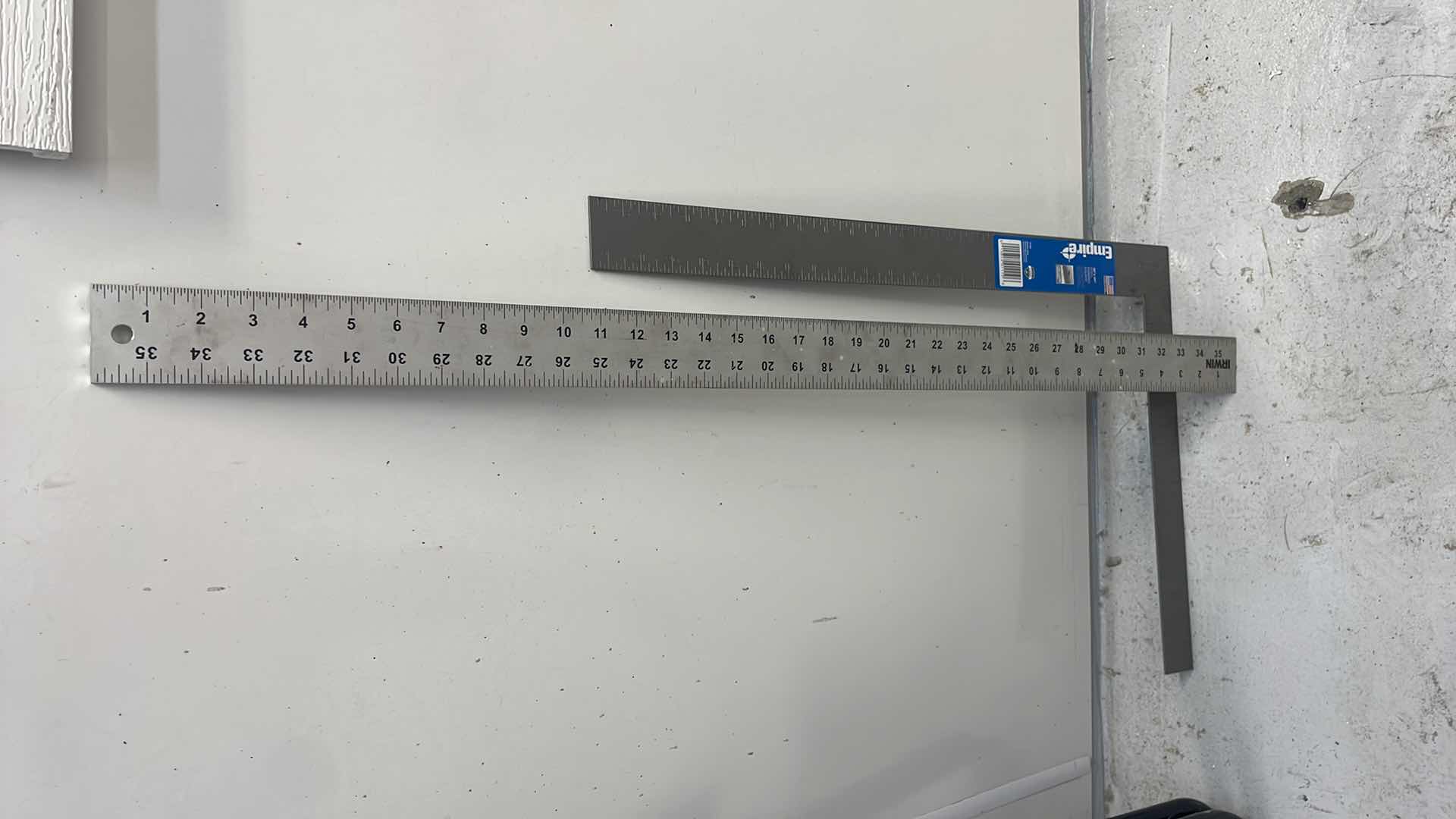 Photo 1 of STEEL FRAMING SQUARE AND 36” IRWIN RULER