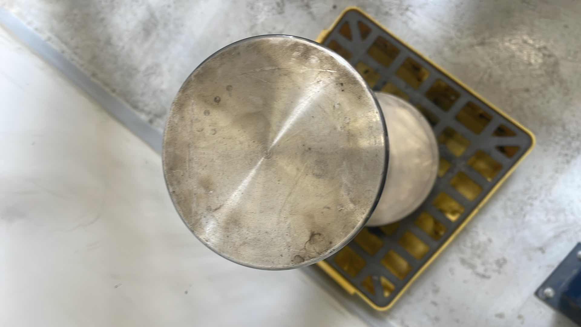 Photo 10 of CHUNK OF STAINLESS STEEL EXTREMELY HEAVY TOP IS 5” DIAMETER X 36-1/2” BASE IS ABOUT 14” DIAMETER X 6”