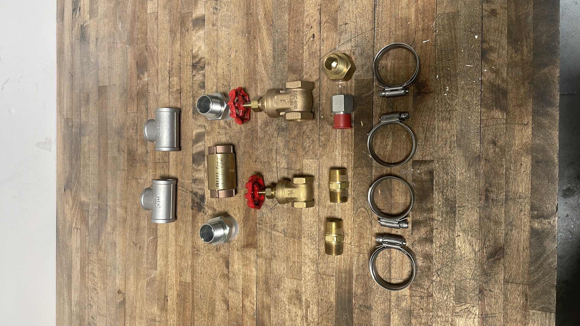 Photo 1 of 1” STAINLESS STEEL TEES, MIDLAND, CHECK VALVE, 1" FEMALE NPT X 1" FEMALE NPT, BRASS, 3/4” & 1” GATE VALVES, MISC BRASS FITTINGS