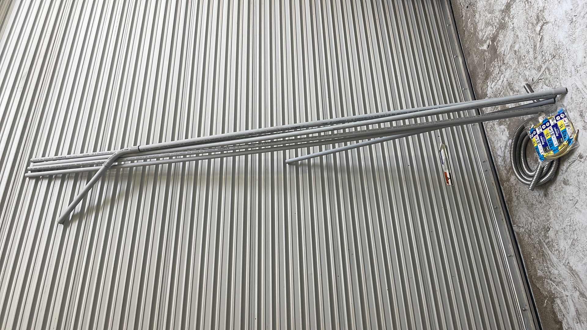 Photo 2 of ELECTRICAL CONDUIT SCHEDULE 40 3/4” 4-10’, SPARE 1” PC, 3/4 FLEX TUBING AND 15’ ROLL OF 12/3 ROMEX