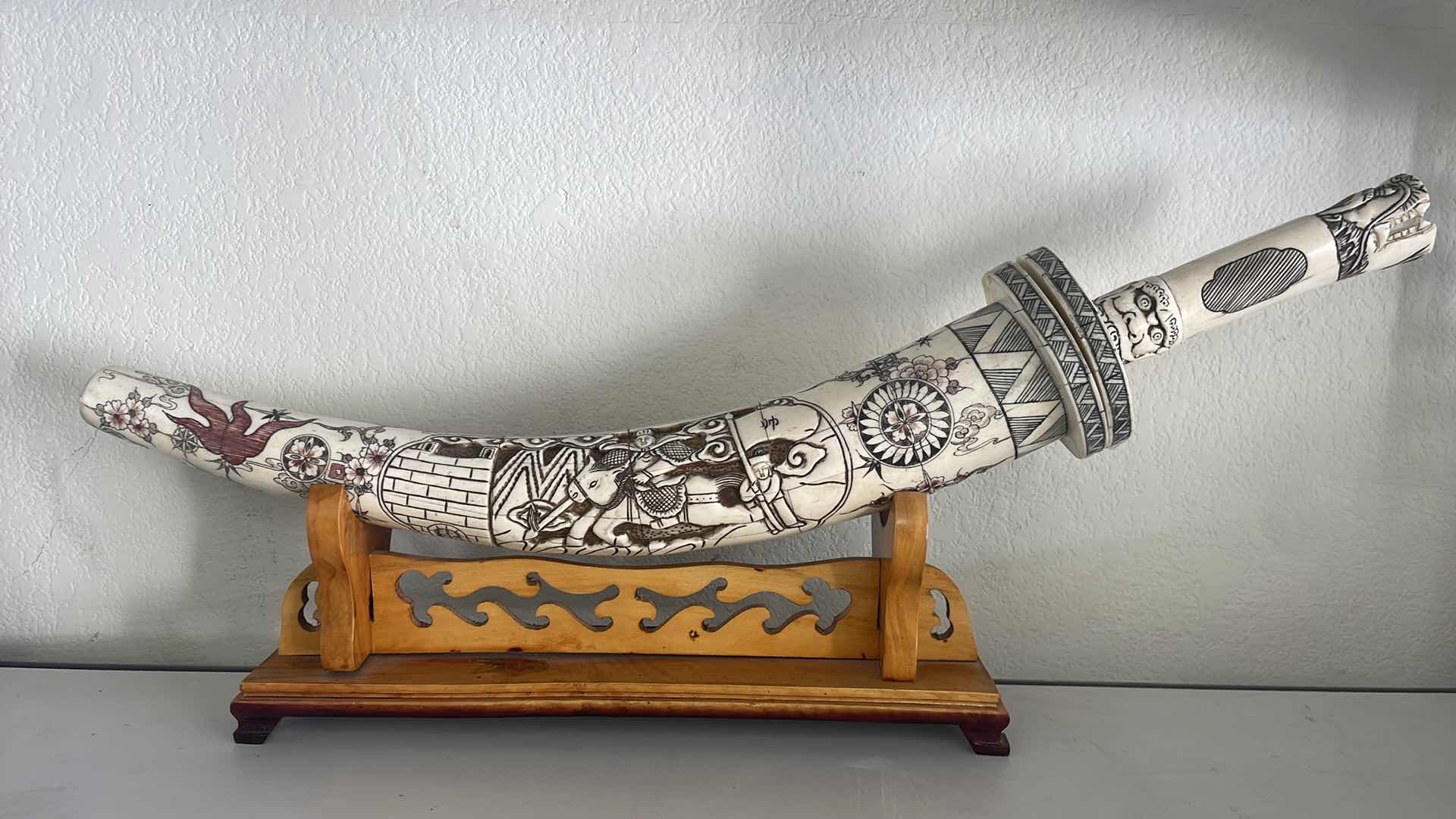 Photo 1 of CARVED BONE TUSK DRAGON SWORD 28” ON WOOD STAND