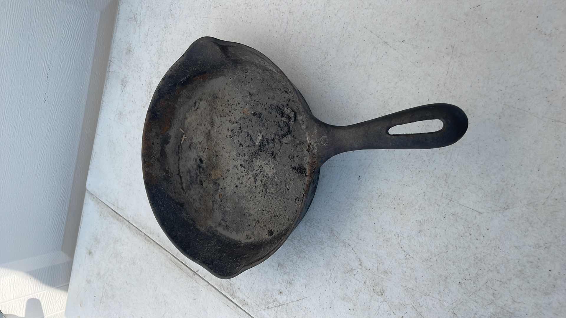 Photo 1 of CAST IRON SKILLET 9” NEEDS CLEANING