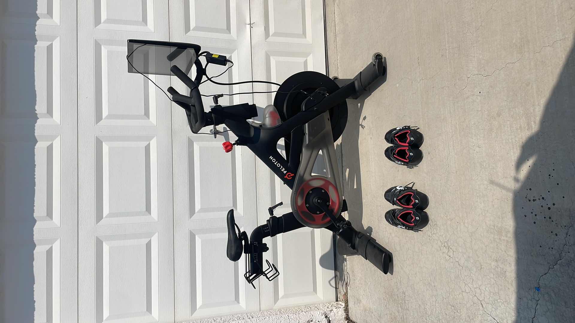 Photo 1 of PELOTON STATIONARY EXERCISE BIKE MODEL PLTN-RB1V1 WITH 2 SHOES SIZE 37 AND 42