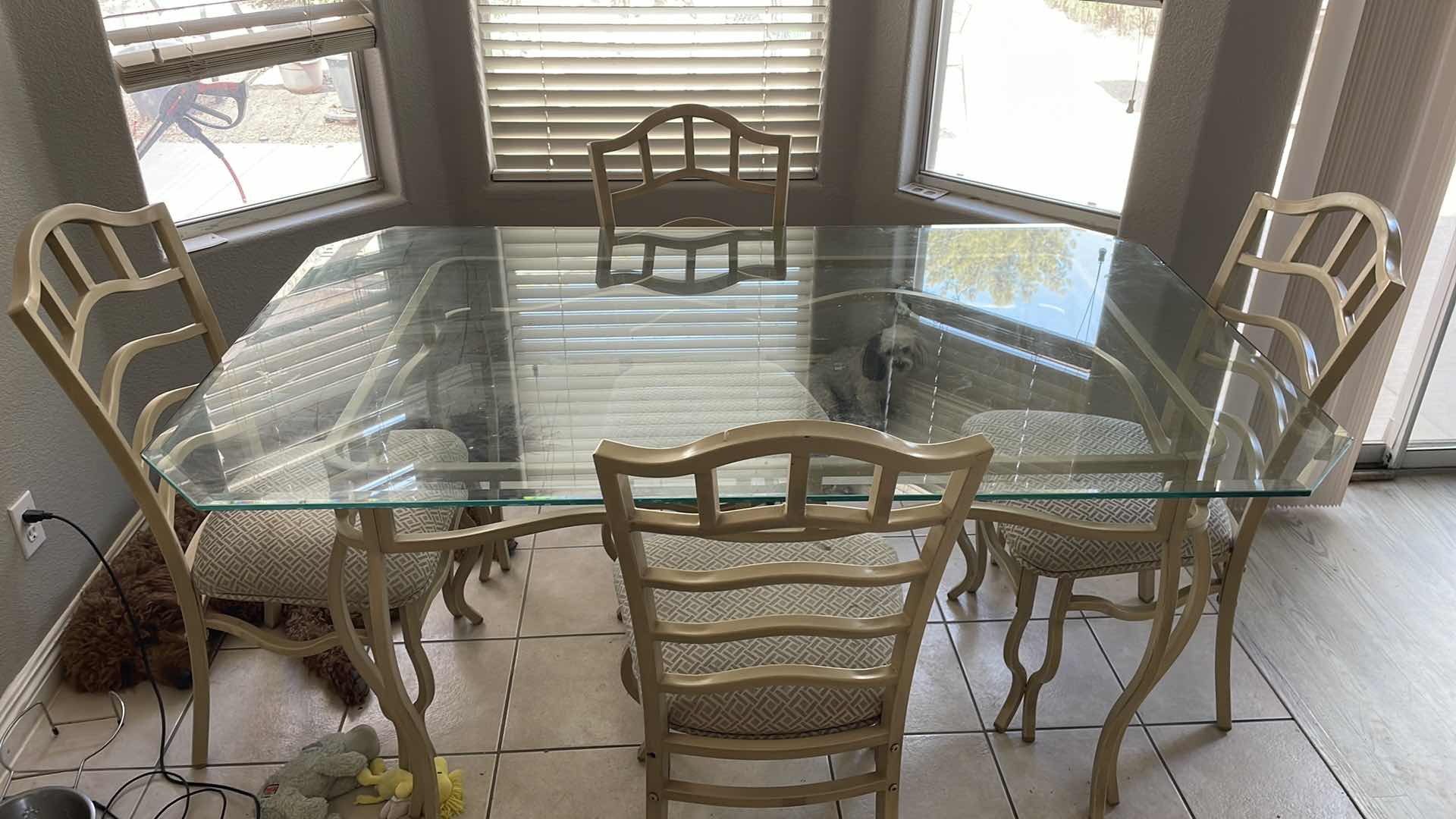 Photo 4 of DINING ROOM GLASS TABLE AND 4 CHAIRS