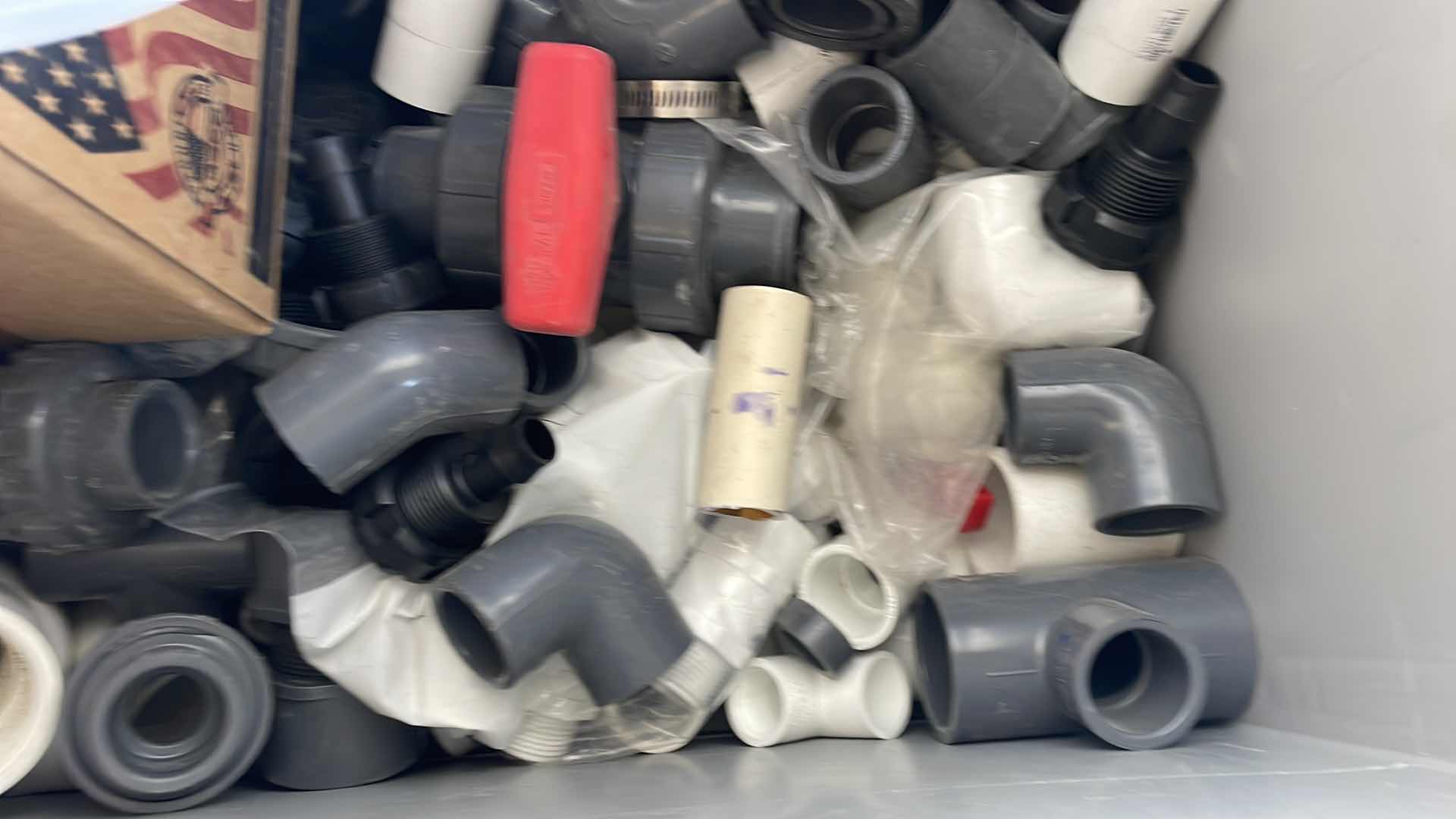 Photo 1 of BOXPLUS 24”x16”x17” FULL OF VARIOUS PVC TEES, ELBOWS, JUNCTIONS,  VALVES, TUBING, CAPS