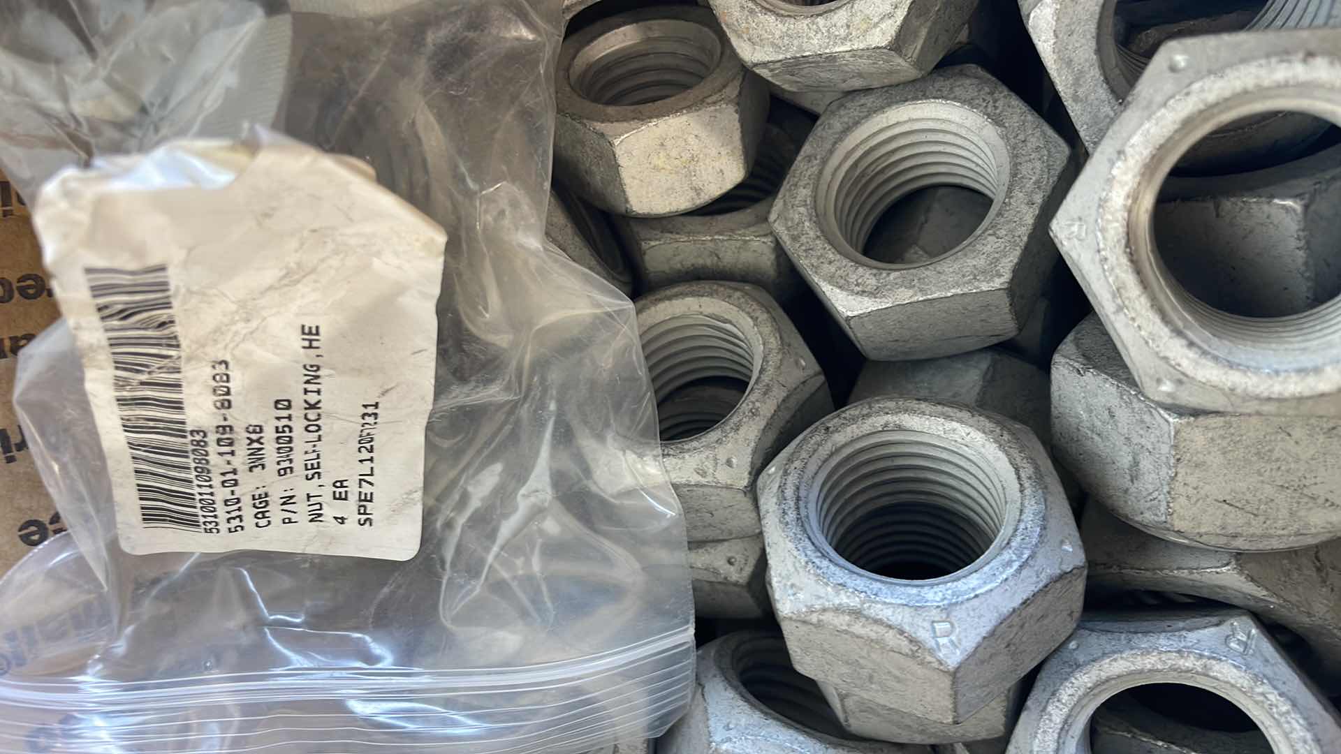 Photo 1 of 1-1/4-7 x 1.07" HEX CONE TOP LOCK NUTS GRADE C STEEL, 1.07"
TALL