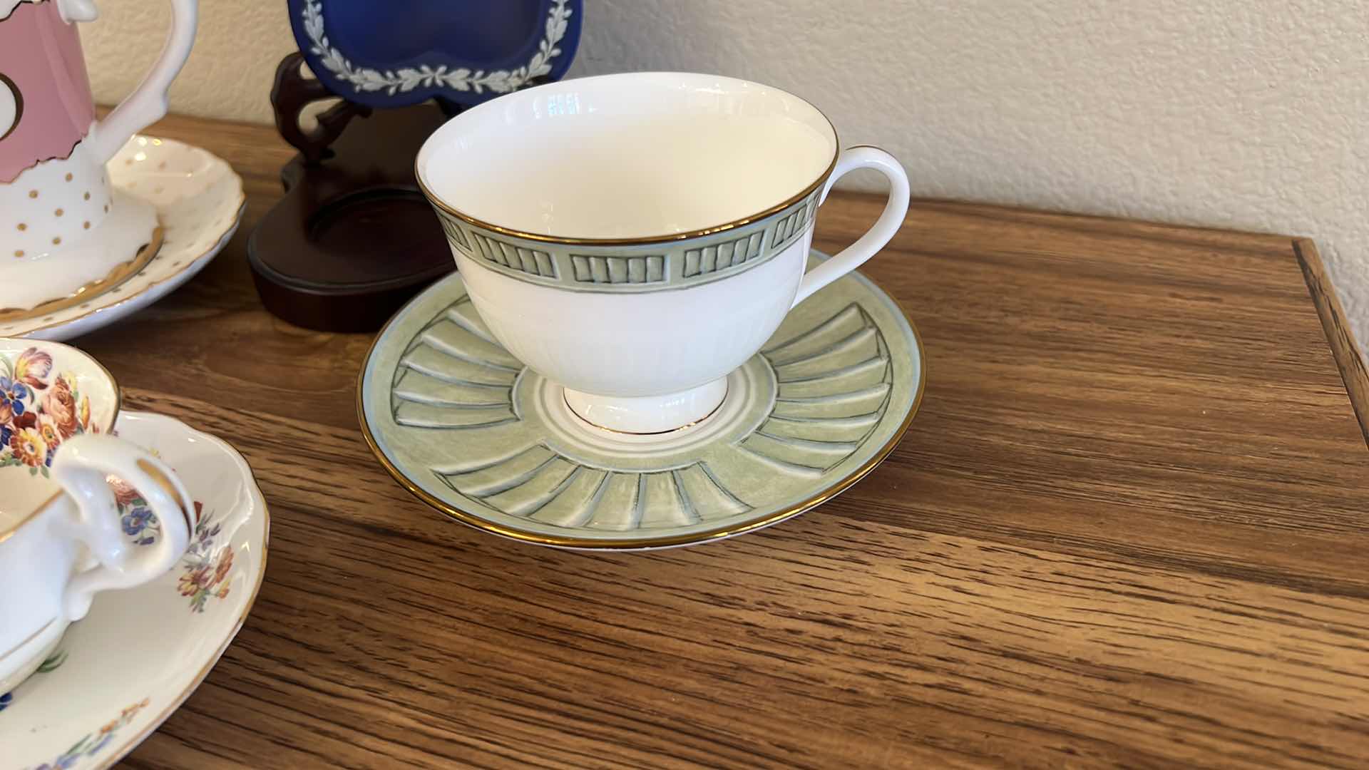 Photo 4 of 3 TEACUPS AND SAUCER SETS, BLUE HEART ON WOOD STAND