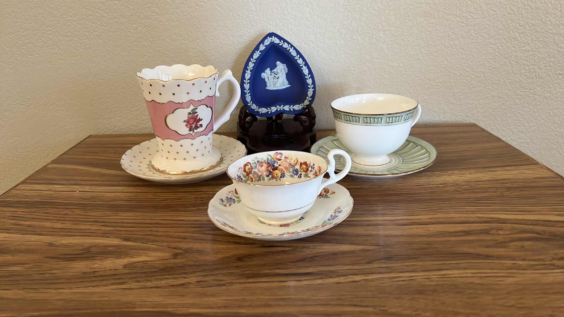 Photo 2 of 3 TEACUPS AND SAUCER SETS, BLUE HEART ON WOOD STAND
