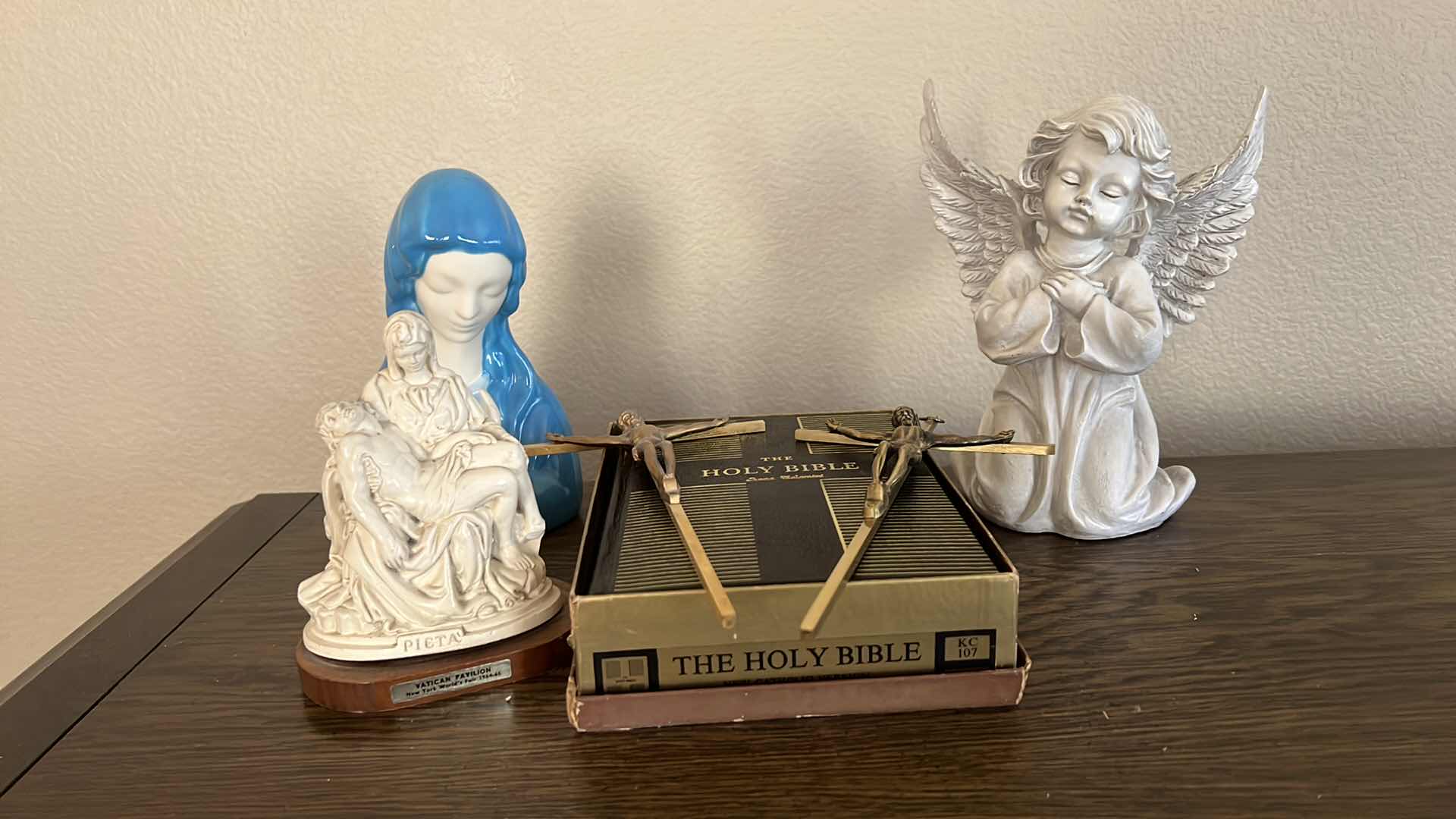 Photo 1 of HOLY BIBLE W RELIGIOUS FIGURINES