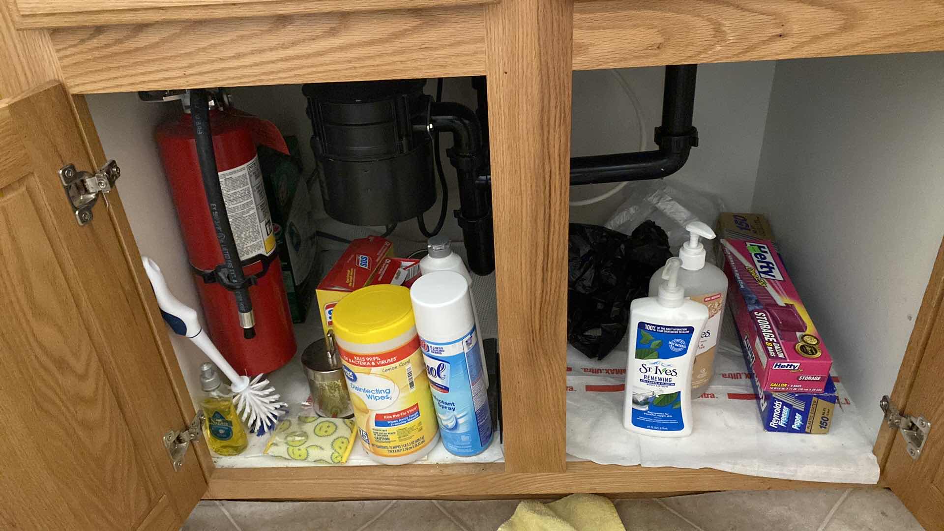 Photo 1 of CONTENTS OF KITCHEN CABINET UNDER SINK