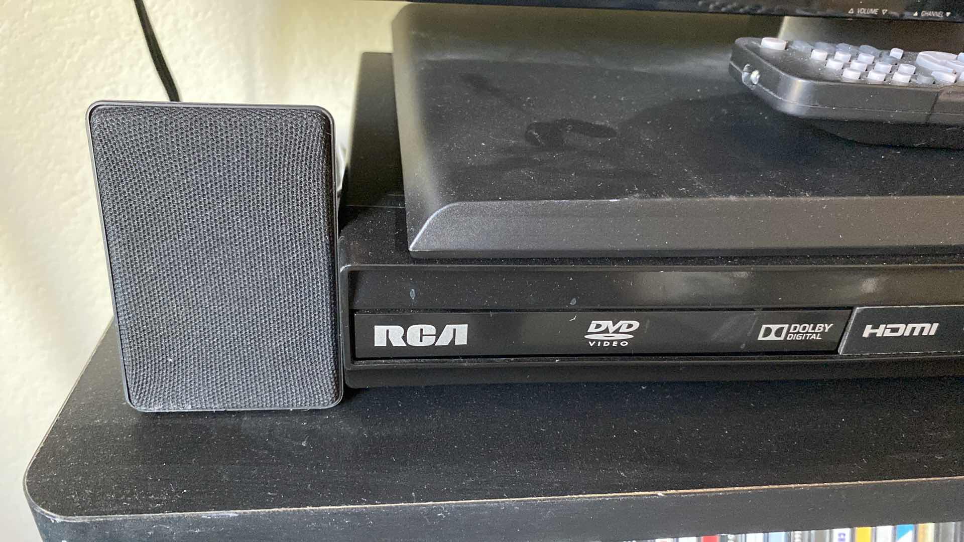 Photo 2 of RCA DVD PLAYER WITH 2 SPEAKERS & REMOTE