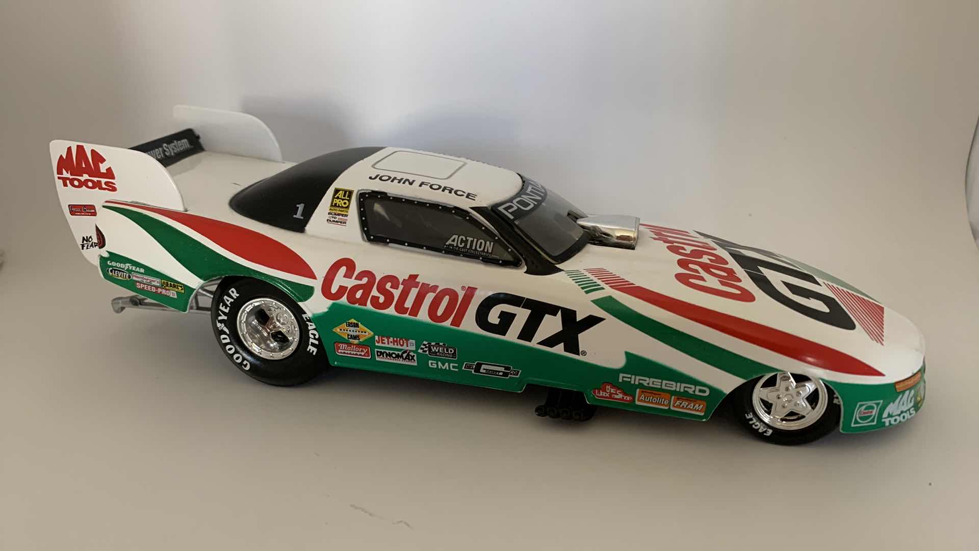 Photo 1 of CASTROL GTX JOHN FORCE DIE CAST CAR.