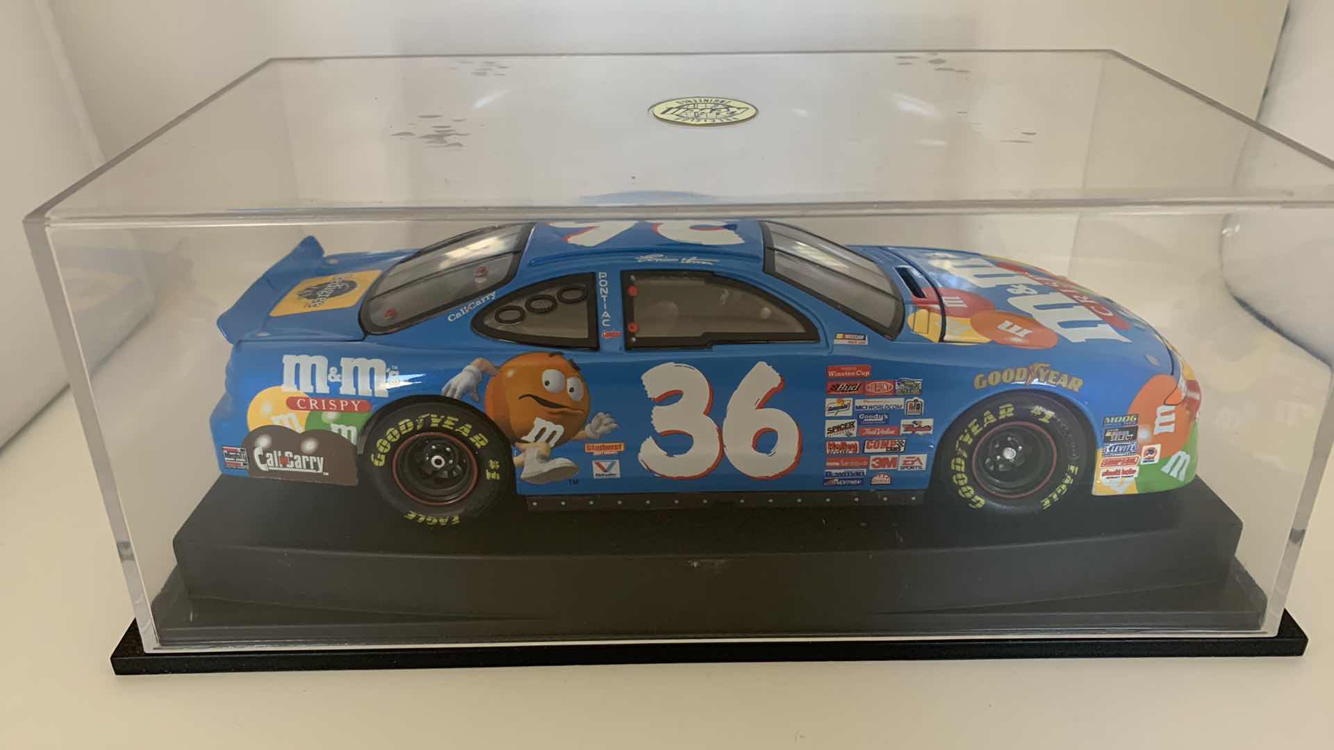 Photo 3 of M&M #36 REVELL COLLECTION ERNIE IRVAN DIE CAST CAR IN SHOW CASE.