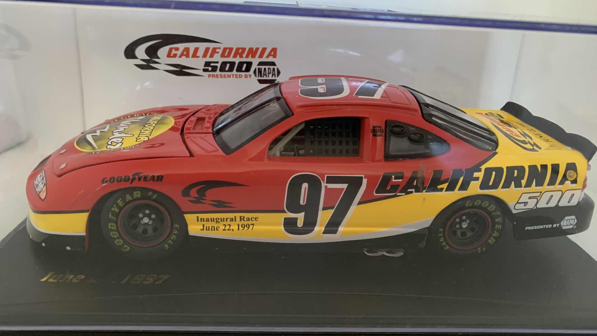 Photo 2 of SPORTS IMPRESSIONS JUNE 22, 1997 CALIFORNIA THUNDER DIE CAST RACE CAR IN SHOW CASE.