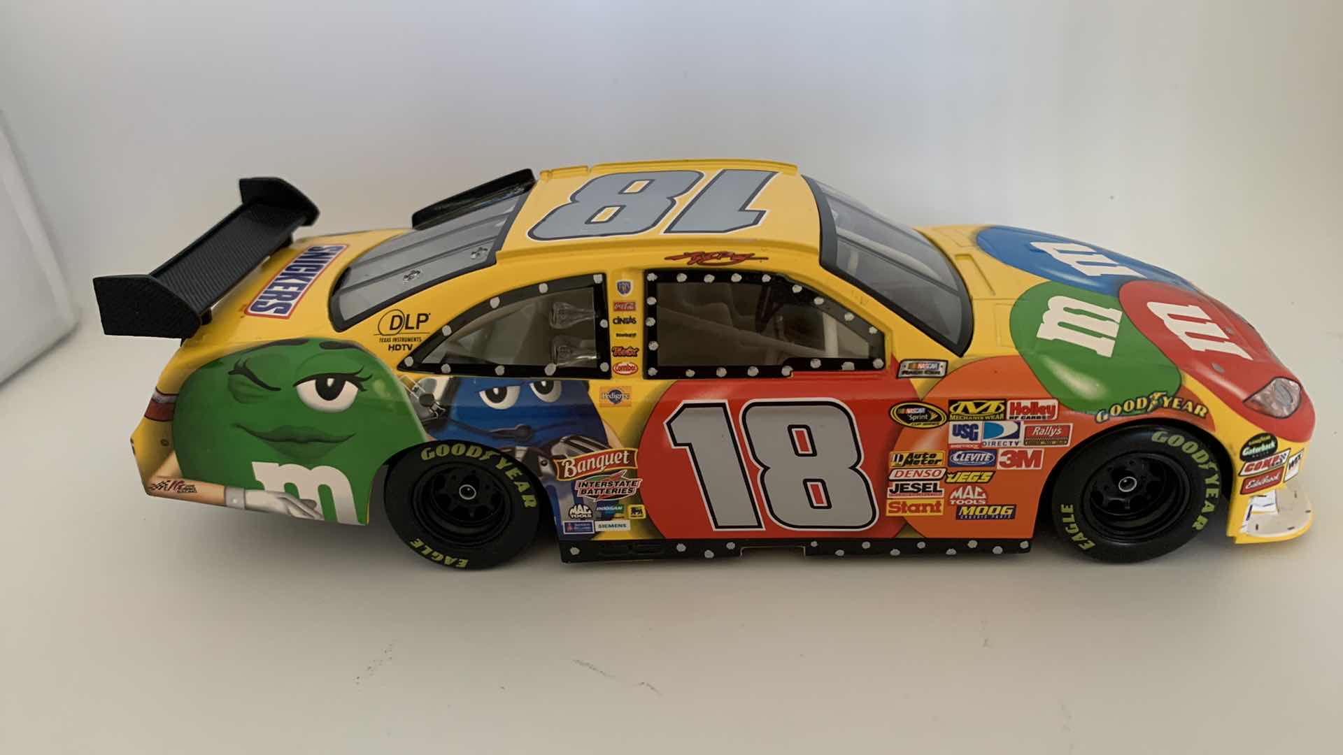 Photo 1 of M & M #18 KYLE BUSCH DIE CAST RACE CAR.