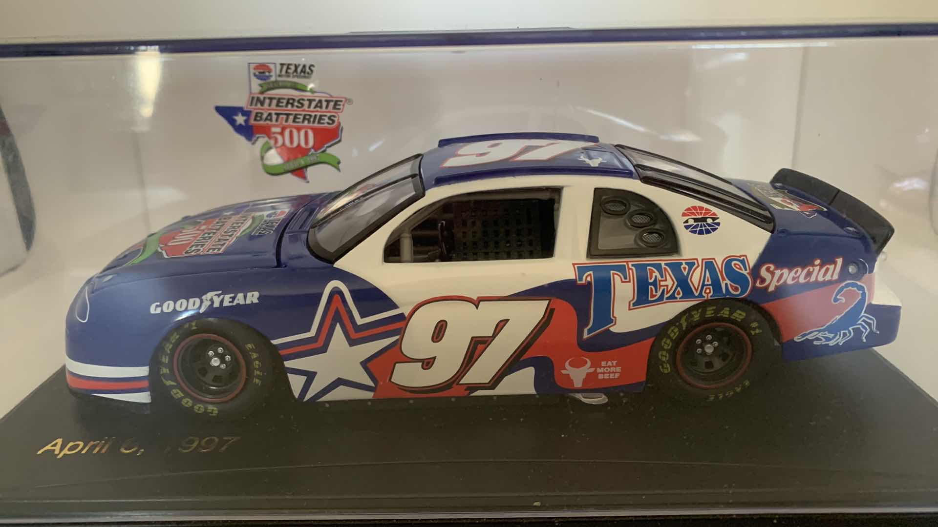 Photo 2 of SPORTS IMPRESSIONS APRIL 6, 1997 #97 TEXAS SPECIAL DIE CAST RACE CAR IN SHOW CASE.