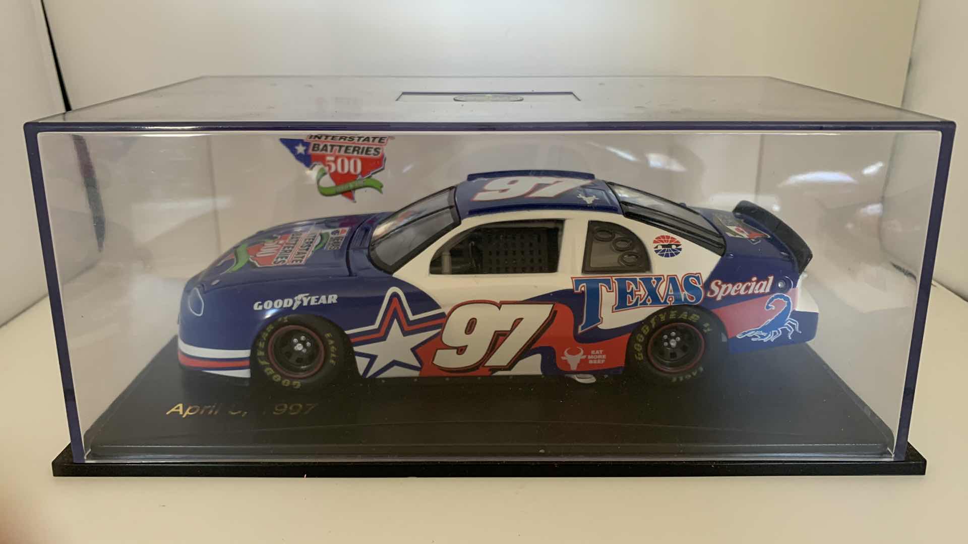 Photo 1 of SPORTS IMPRESSIONS APRIL 6, 1997 #97 TEXAS SPECIAL DIE CAST RACE CAR IN SHOW CASE.