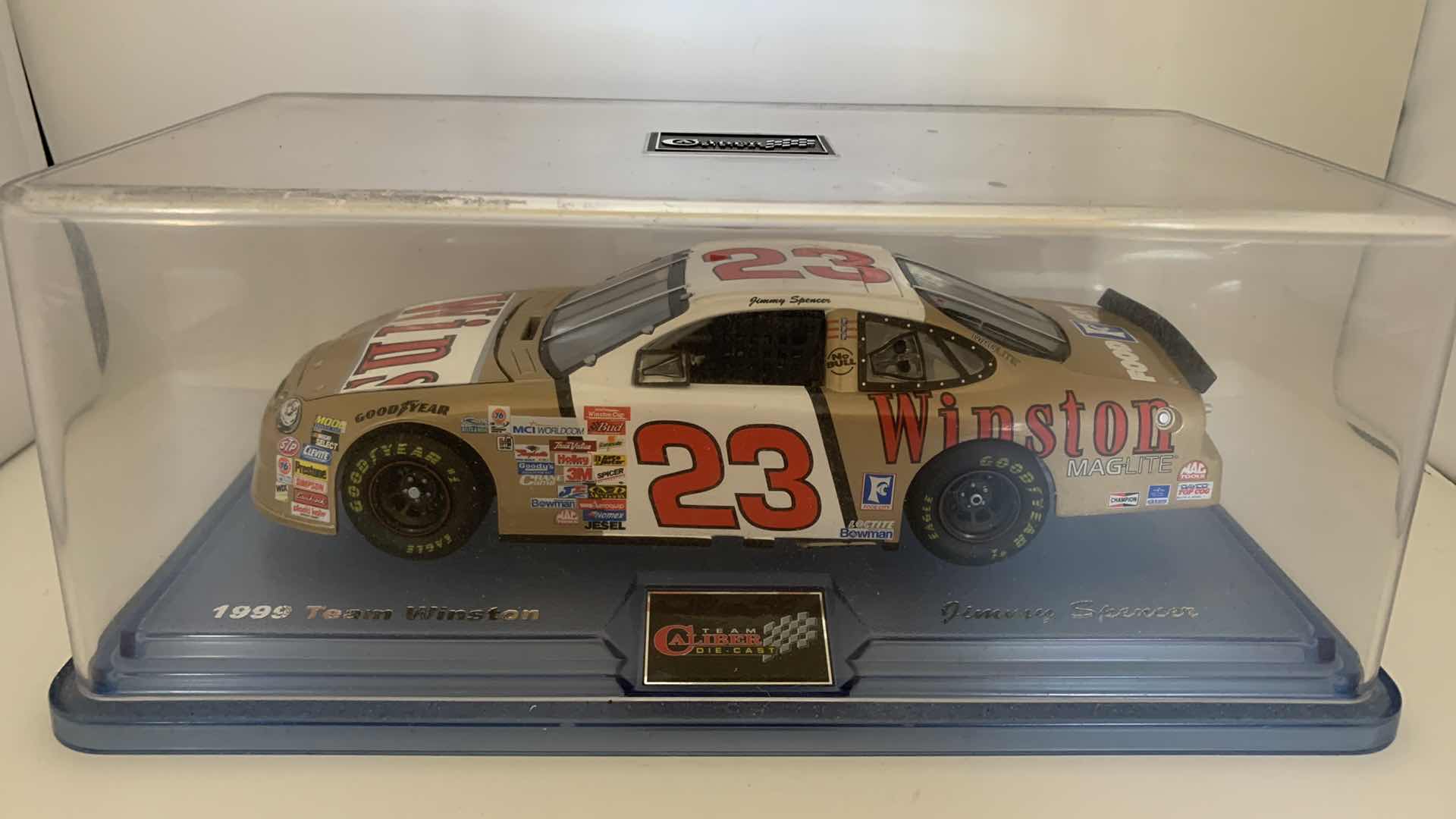 Photo 1 of 1999 TEAM WINSTON #23 JIMMY SPENCER DIE CAST CAR IN SHOW CASE.