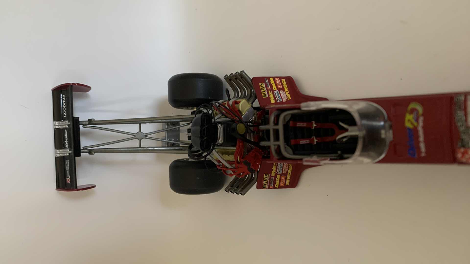 Photo 4 of BILSTEIN ENGINE FLUSH TOP FUEL DIE CAST RACE CAR.