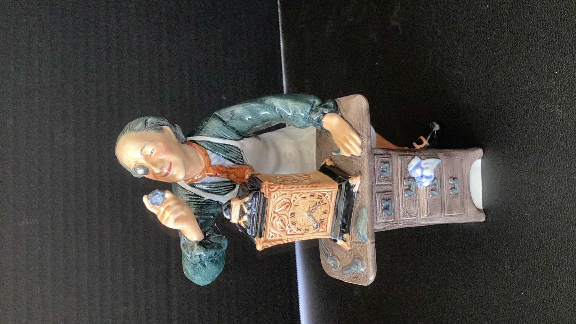 Photo 1 of ROYAL DOULTON “THE CLOCKMAKER” 7” TALL