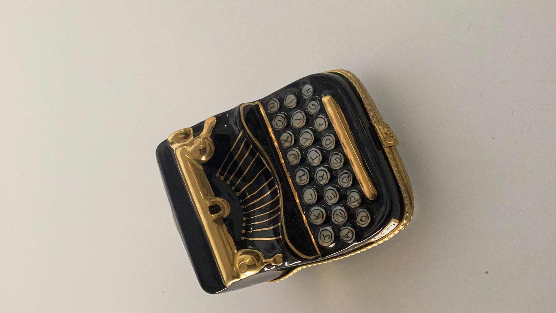 Photo 1 of LIMOGES FRANCE PORCELAIN TYPEWRITER PILL BOX 2” WIDE 