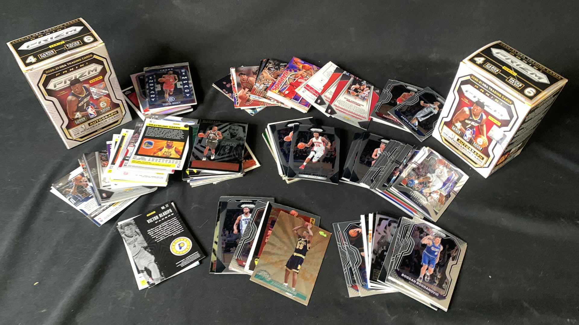 Photo 2 of STACK OF COLLECTIBLE BASKETBALL CARDS