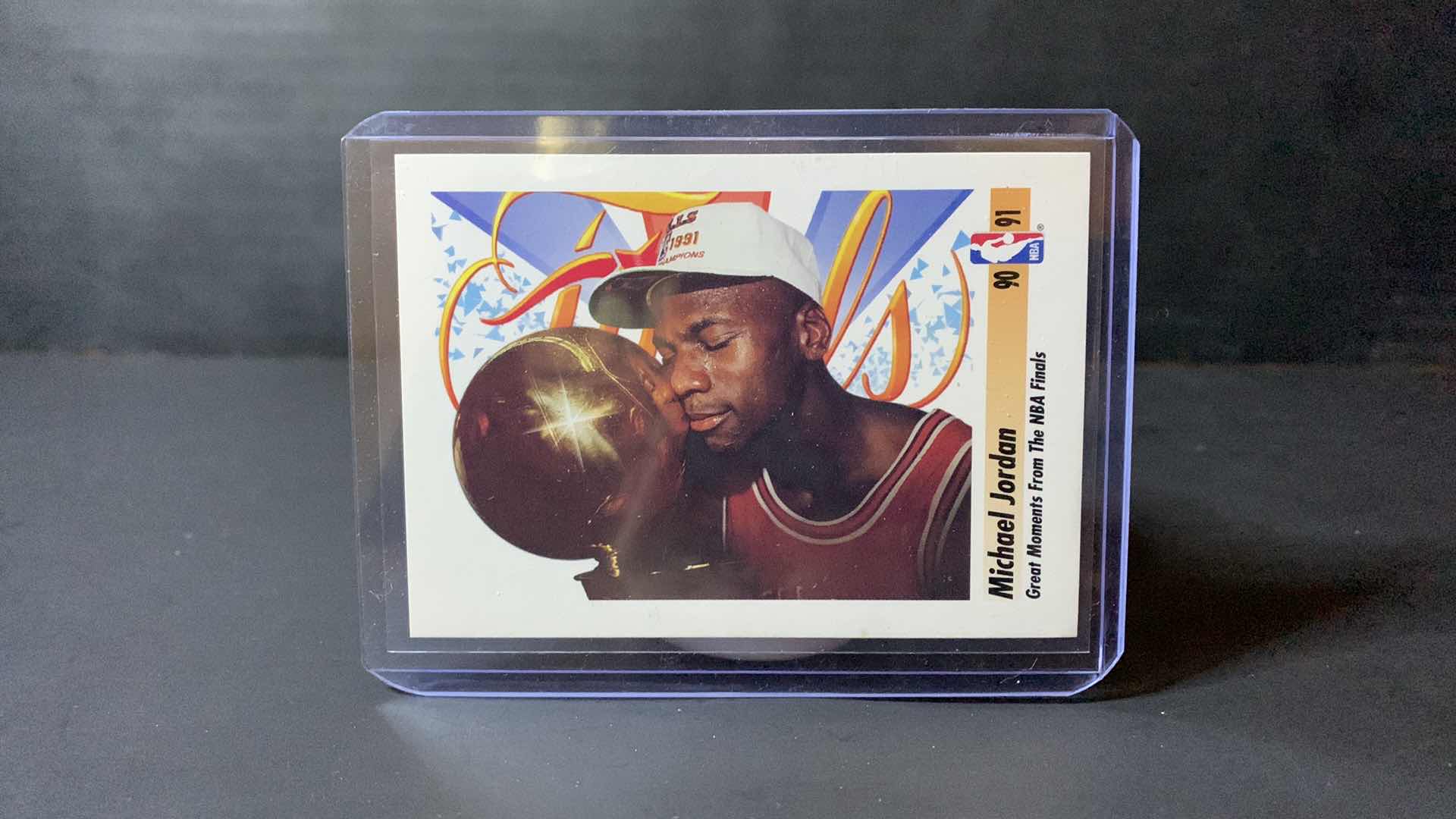 Photo 1 of 1991 SKYBOX MICHEAL JORDAN “MICHAEL BRINGS HOME THE TROPHY” CARD