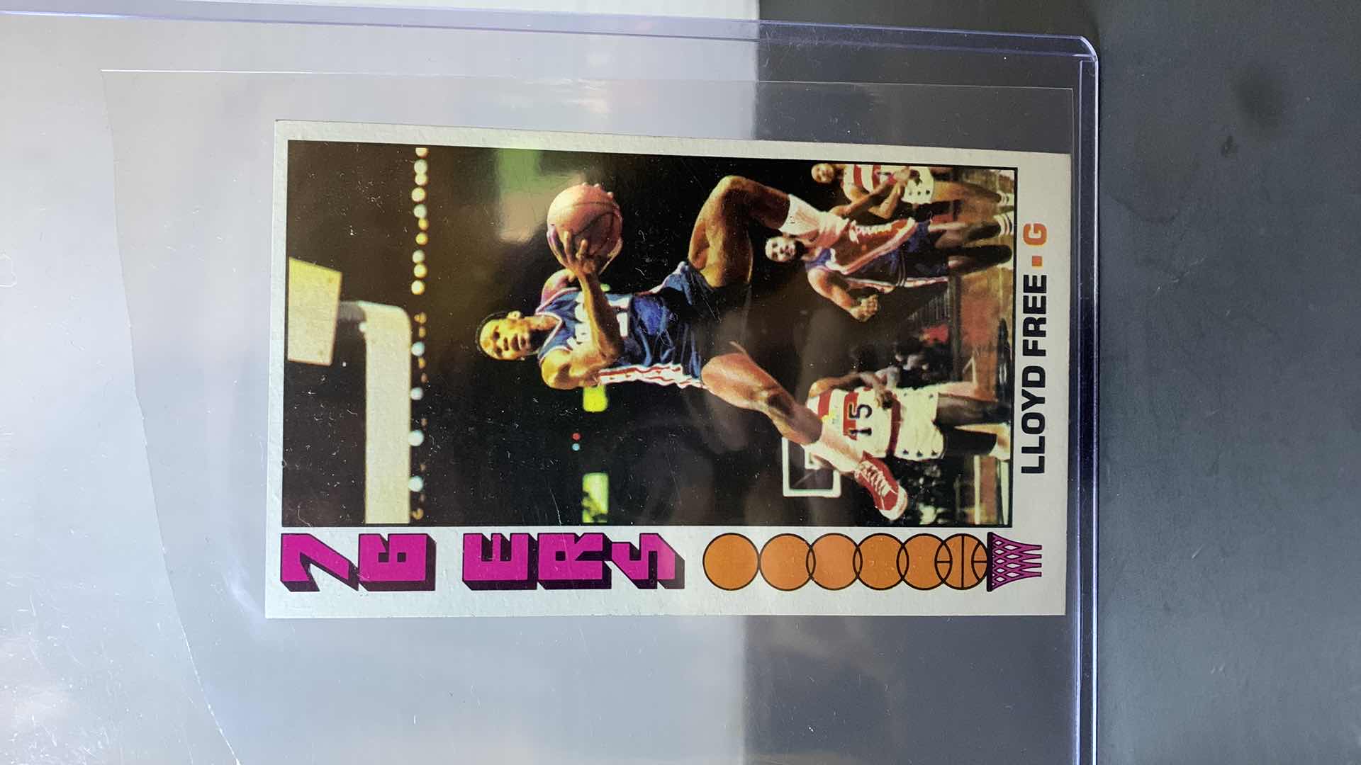 Photo 1 of 1976 TOPPS LLOYD FREE 76ERS CARD