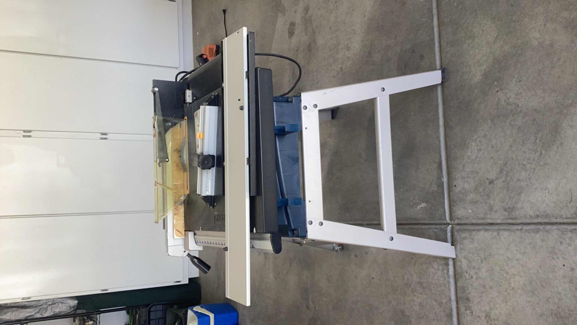 Photo 1 of RYOBI 10” PORTABLE TABLE SAW WITH STAND