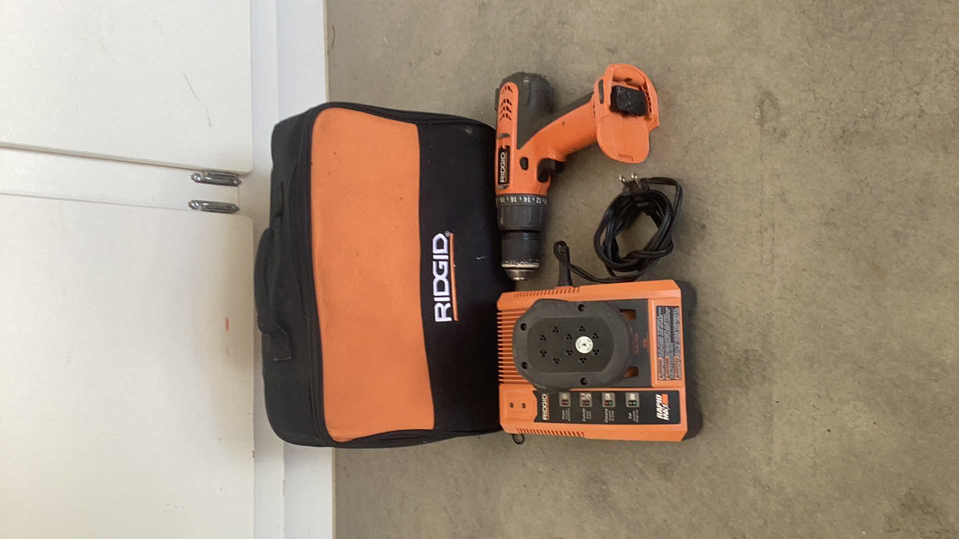 Photo 1 of RIGID POWER DRILL WITH CHARGER, 2 BATTERIES, AND CASE