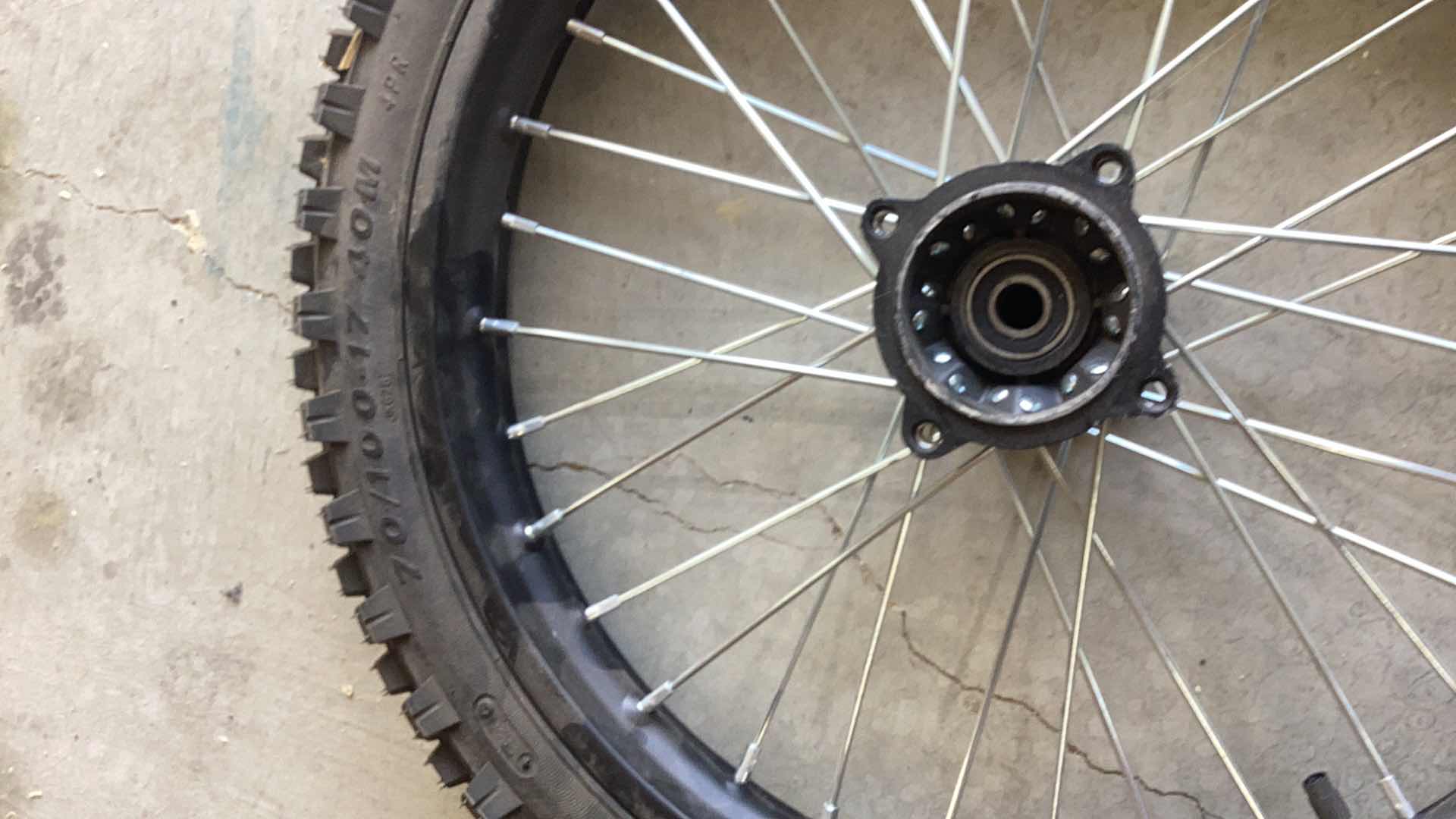 Photo 2 of TOUGH GEAR 70/100-17 40M MOTORCYCLE TIRE AND RIM