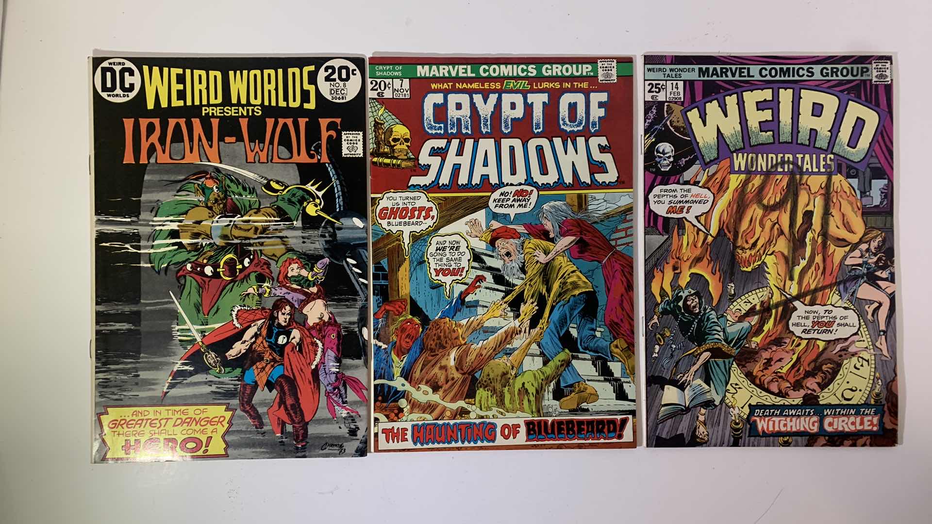 Photo 1 of DC AND MARVEL 1973 AND 1975 IRON-WOLF, CRYPT OF SHADOWS, AND WEIRD WONDER TALES COMICS