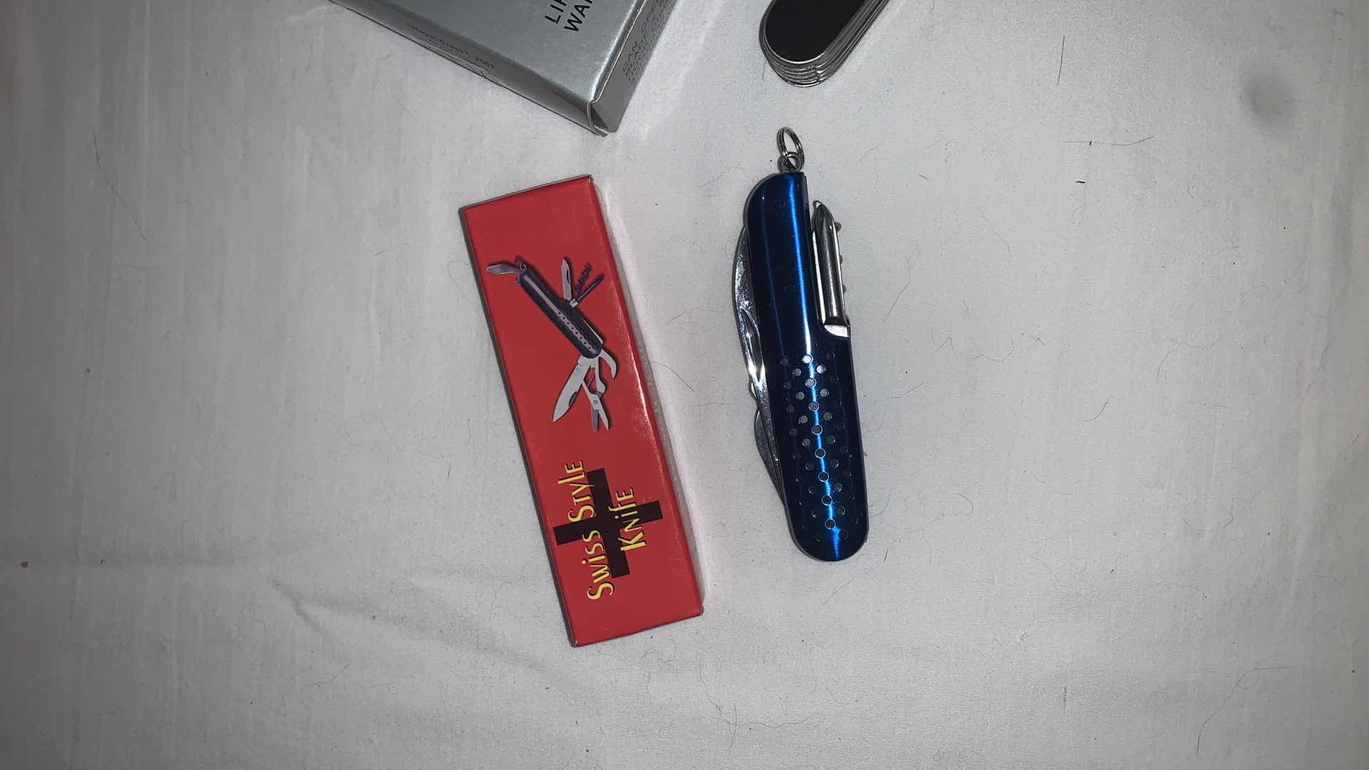 Photo 2 of SET OF SWISS STYLE KNIVES IN BOX