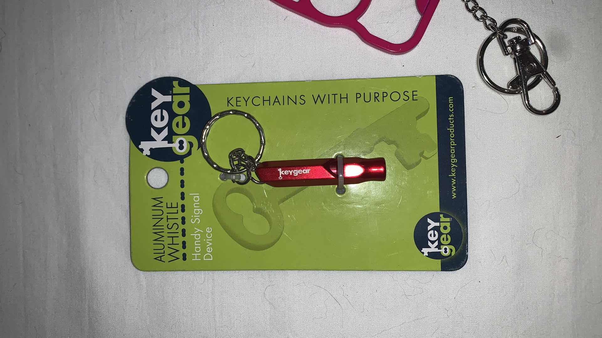 Photo 2 of KEYCHAIN PROTECTION SET WITH WHISTLE AND CAT EYES MELEE