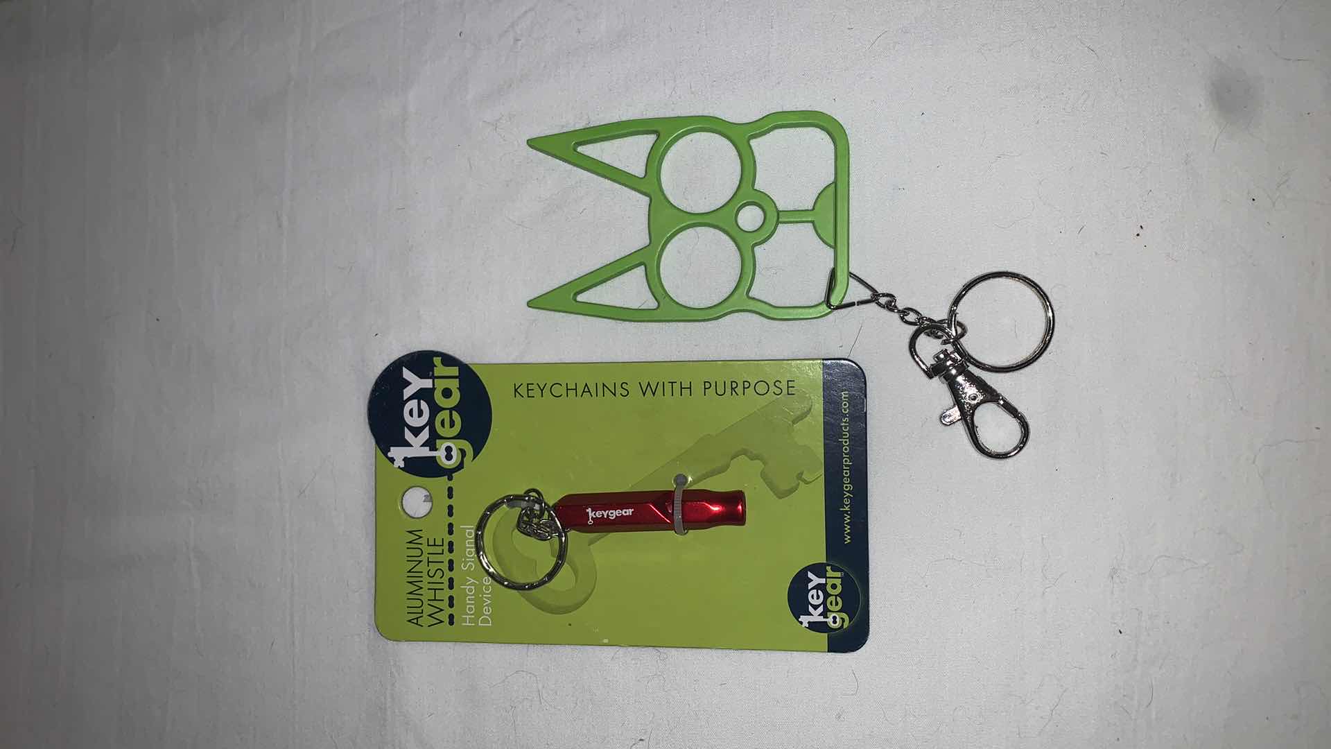 Photo 1 of KEYCHAIN PROTECTION SET WITH WHISTLE AND CAT EYES MELEE