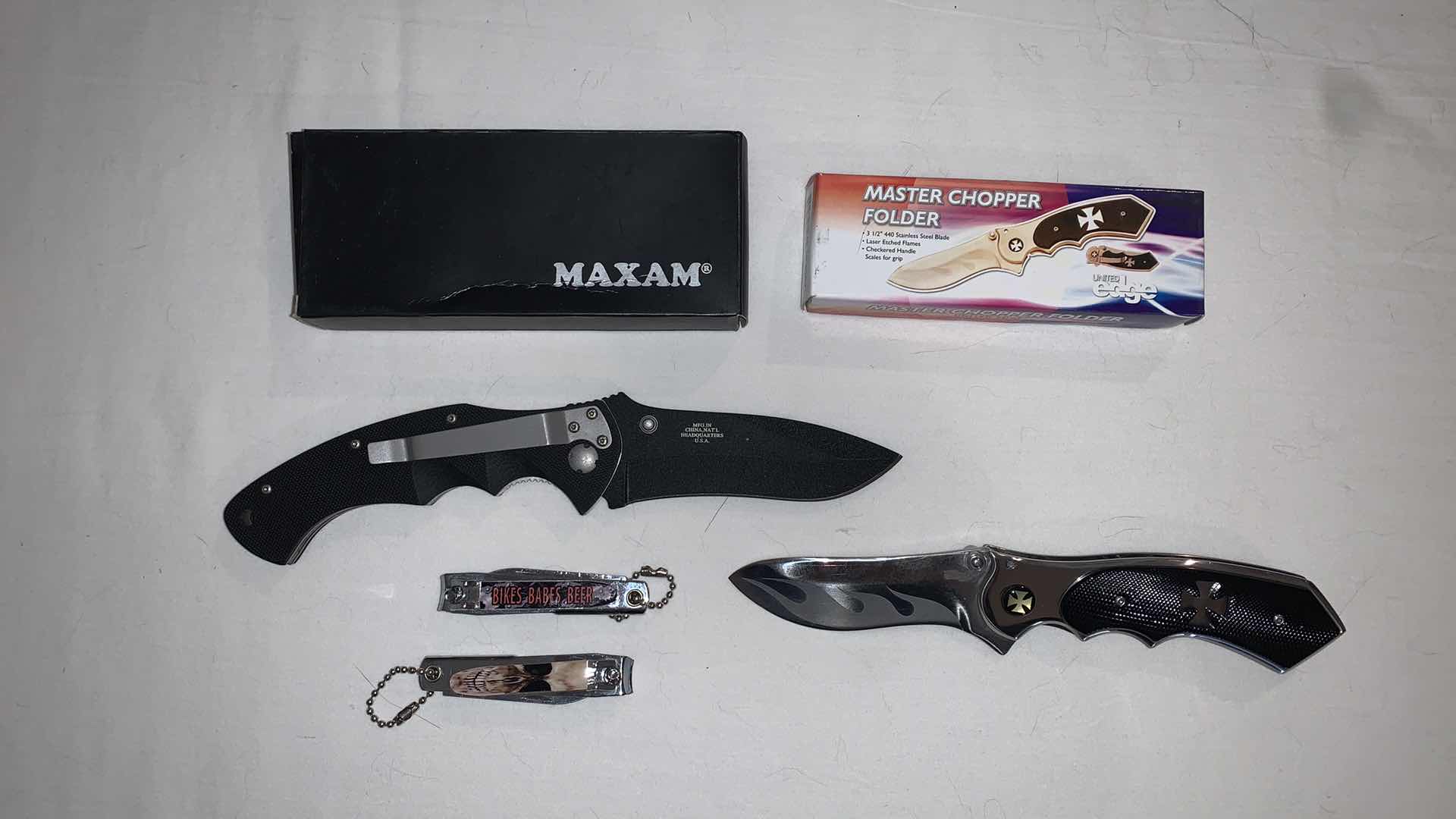 Photo 1 of SET OF BIKER MEMEROBILIA AND KNIVES