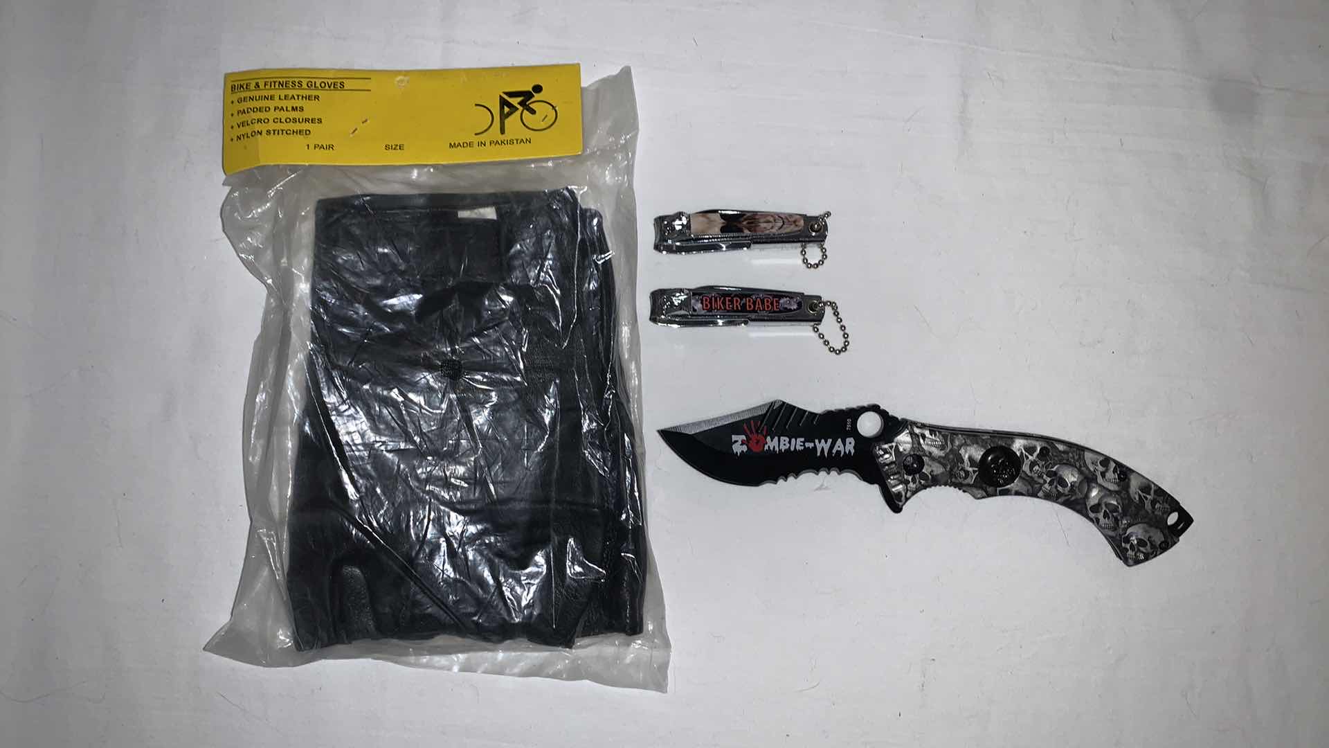 Photo 1 of SET OF BIKER MEMEROBILIA WITH KNIFE AND GLOVES