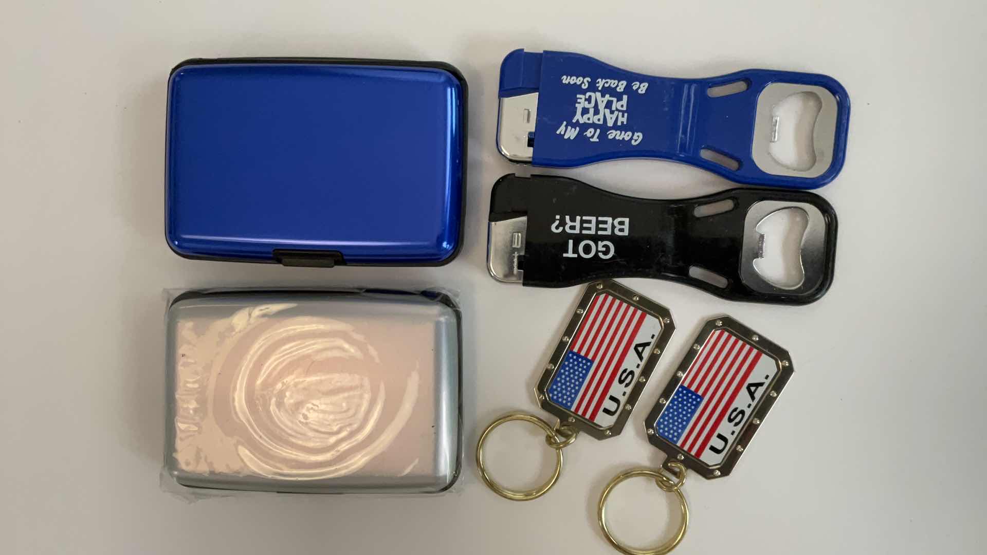 Photo 1 of CARDHOLDERS, KEYCHAINS AND LIGHTER/BOTTLE OPENERS