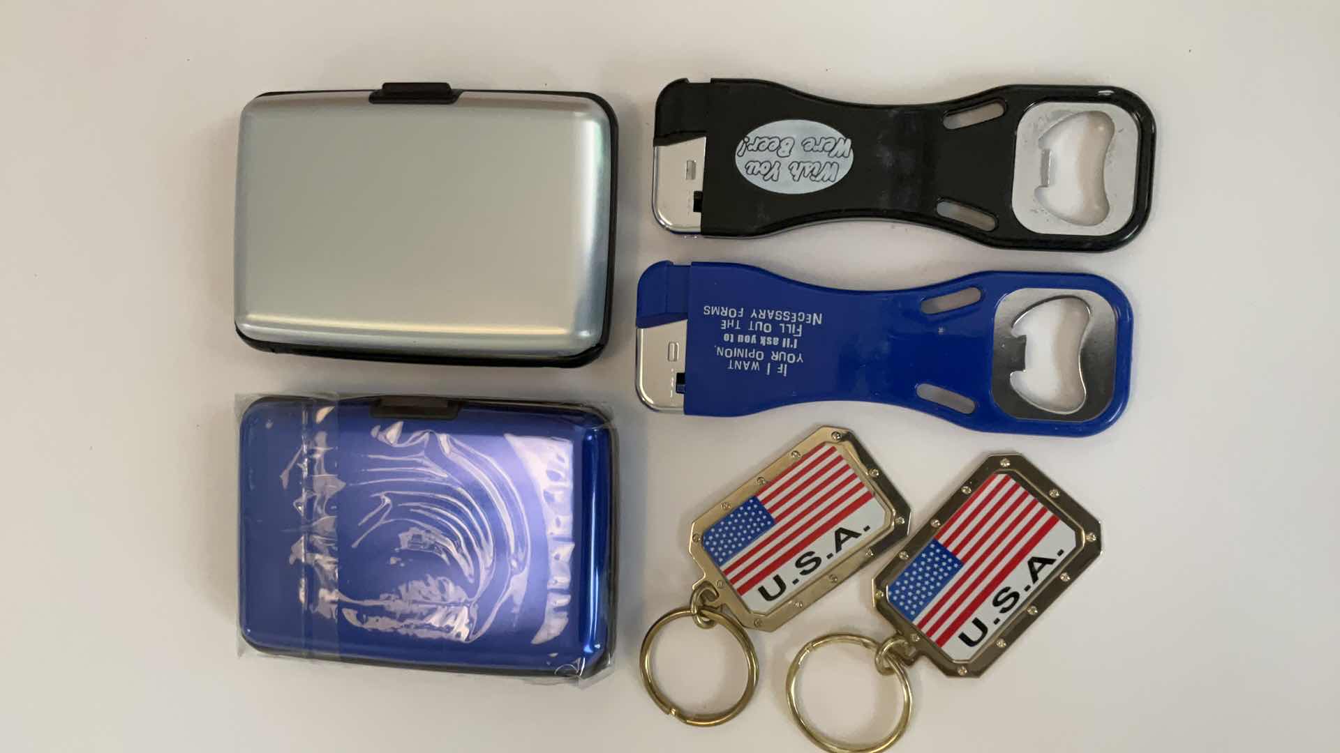 Photo 1 of CARDHOLDERS, KEYCHAINS AND LIGHTER/BOTTLE OPENERS