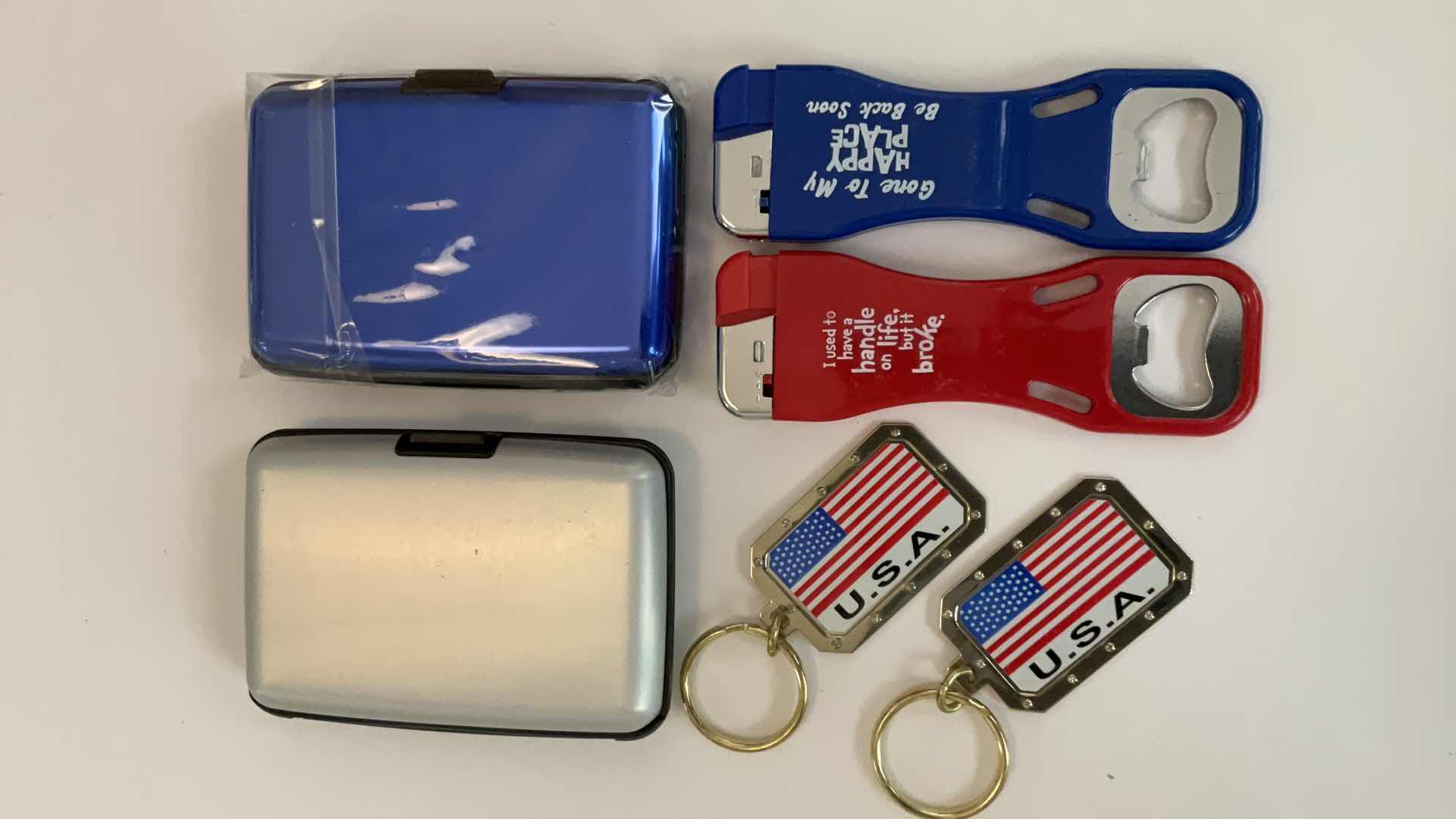 Photo 1 of CARDHOLDERS, KEYCHAINS AND LIGHTER/BOTTLE OPENERS