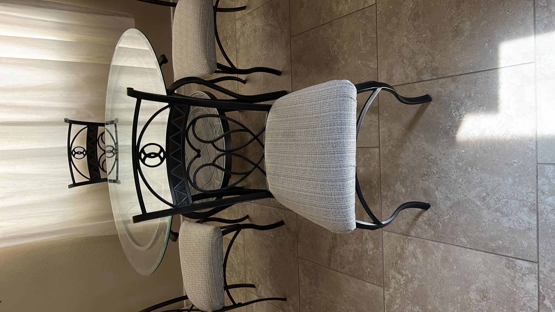 Photo 4 of  48" ROUND WROUGHT IRON TABLE W GLASSTOP & 4 SIDE CHAIRS W PADDED SEAT