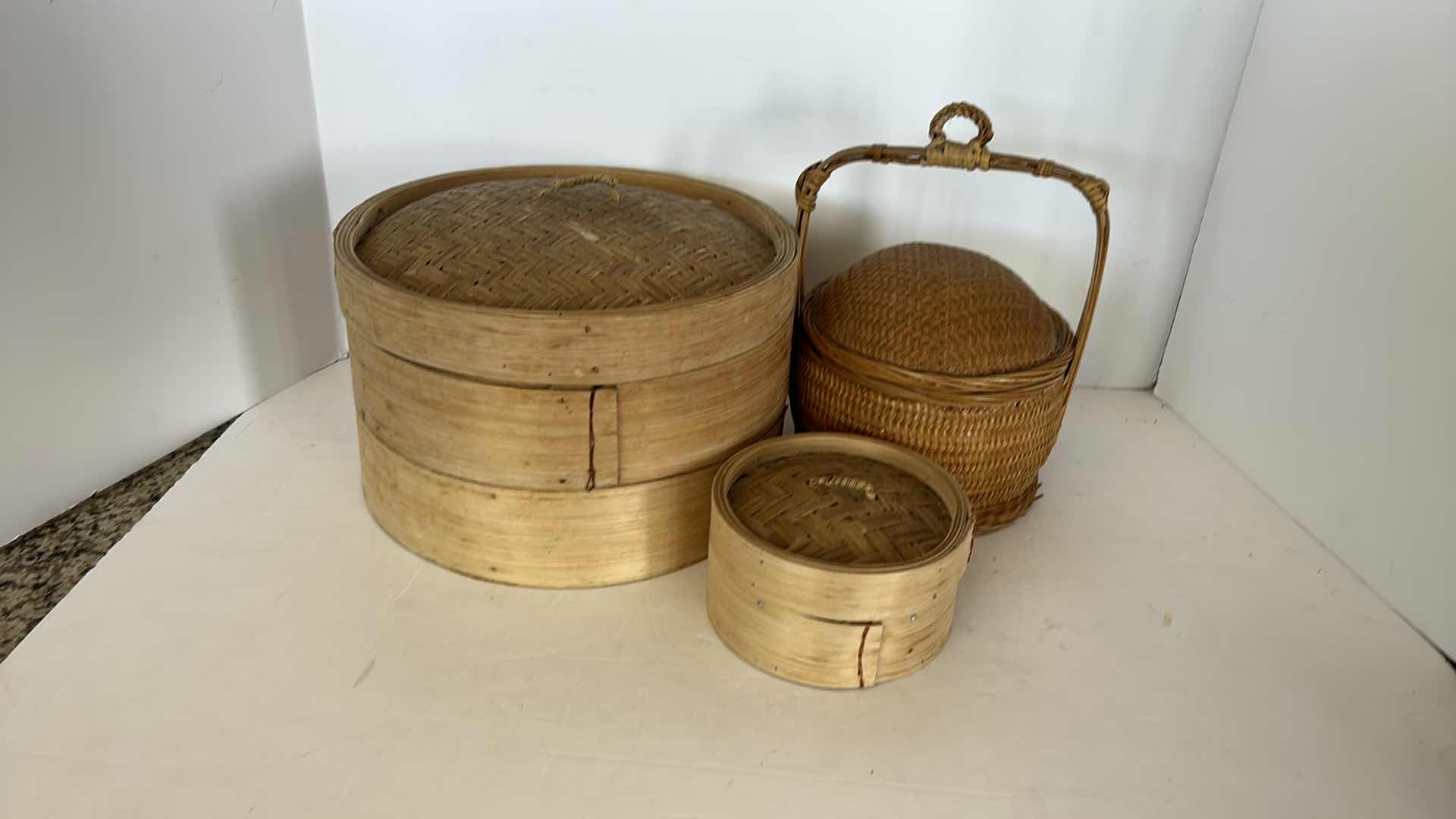 Photo 2 of 3 - CHINESE WICKER VEGTABLE STEAMING BASKETS.  LARGEST 10 1/2” x 7”