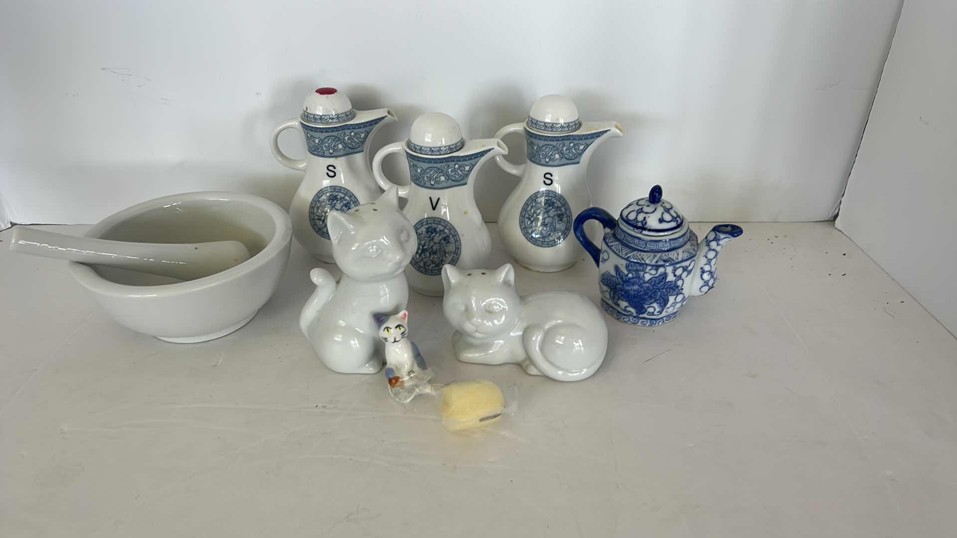 Photo 2 of PORCELAIN COLLECTIBLES, KITCHEN ACCESSORIES AND MORTER AND PESTLE 