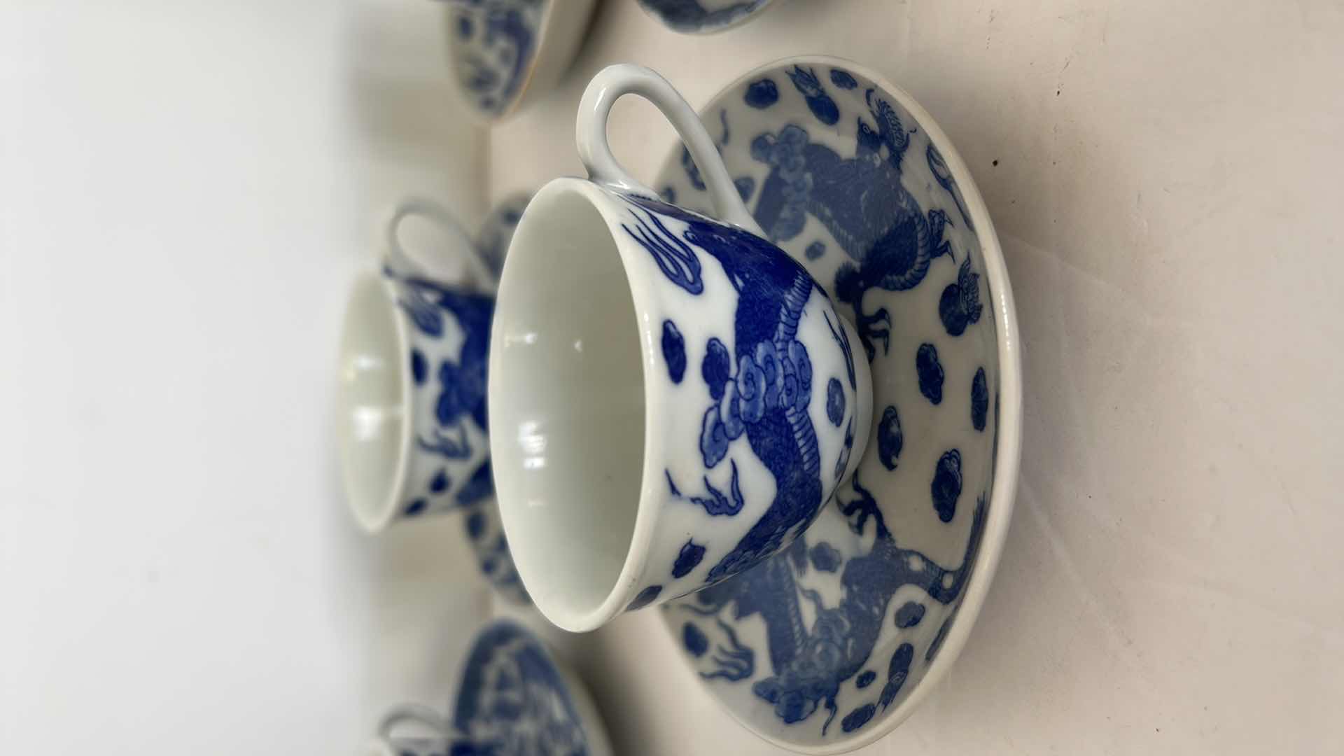 Photo 3 of  19 PIECES -SMALL BLUE AND WHITE  PORCELAIN TEACUP / ESPRESSO ASSORTMENT 