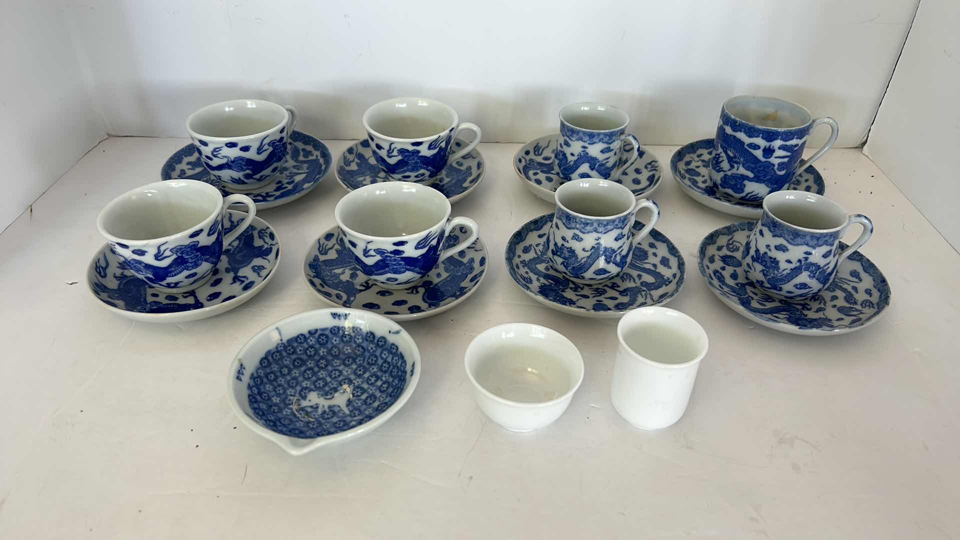 Photo 12 of  19 PIECES -SMALL BLUE AND WHITE  PORCELAIN TEACUP / ESPRESSO ASSORTMENT 