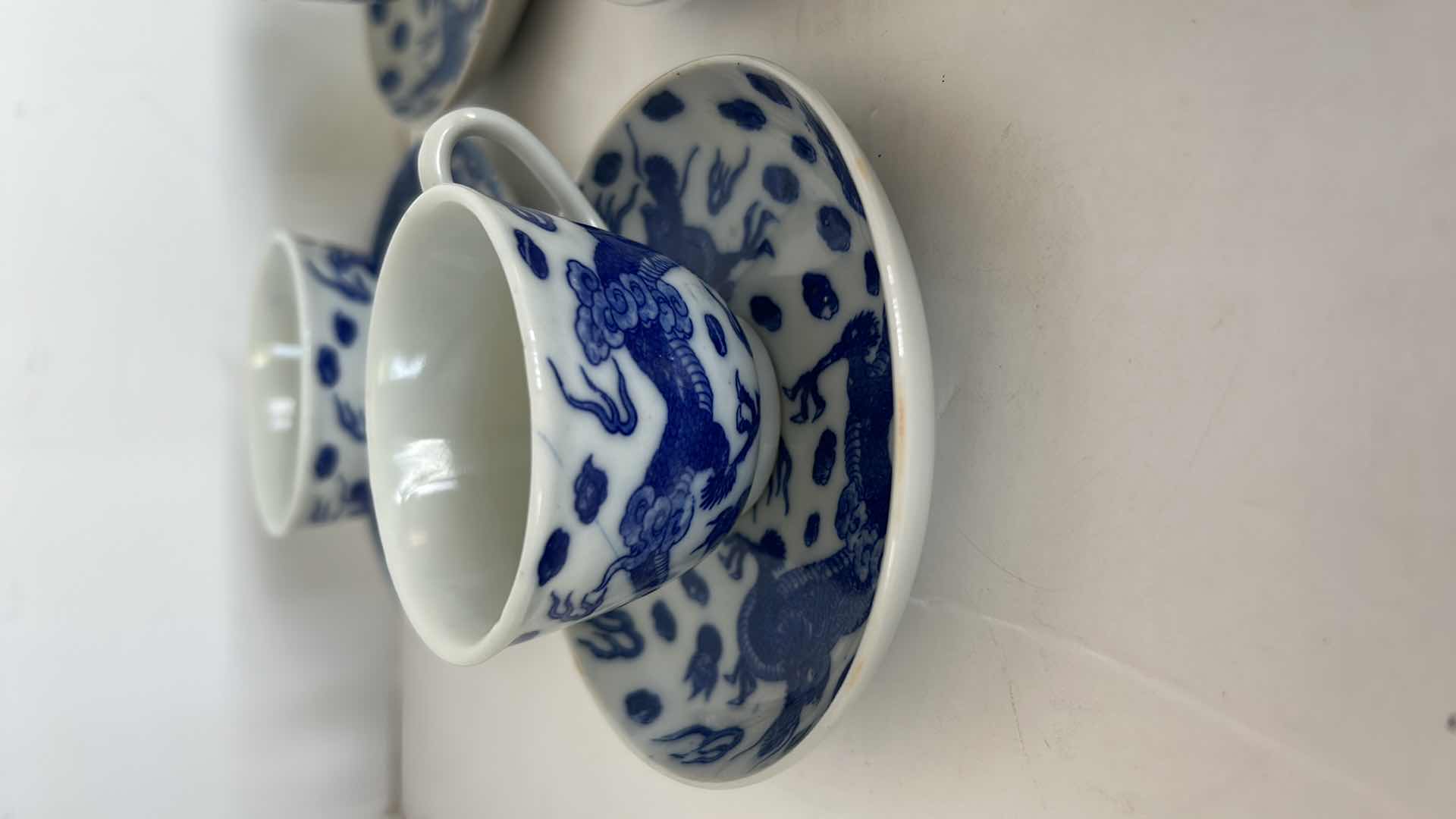 Photo 2 of  19 PIECES -SMALL BLUE AND WHITE  PORCELAIN TEACUP / ESPRESSO ASSORTMENT 
