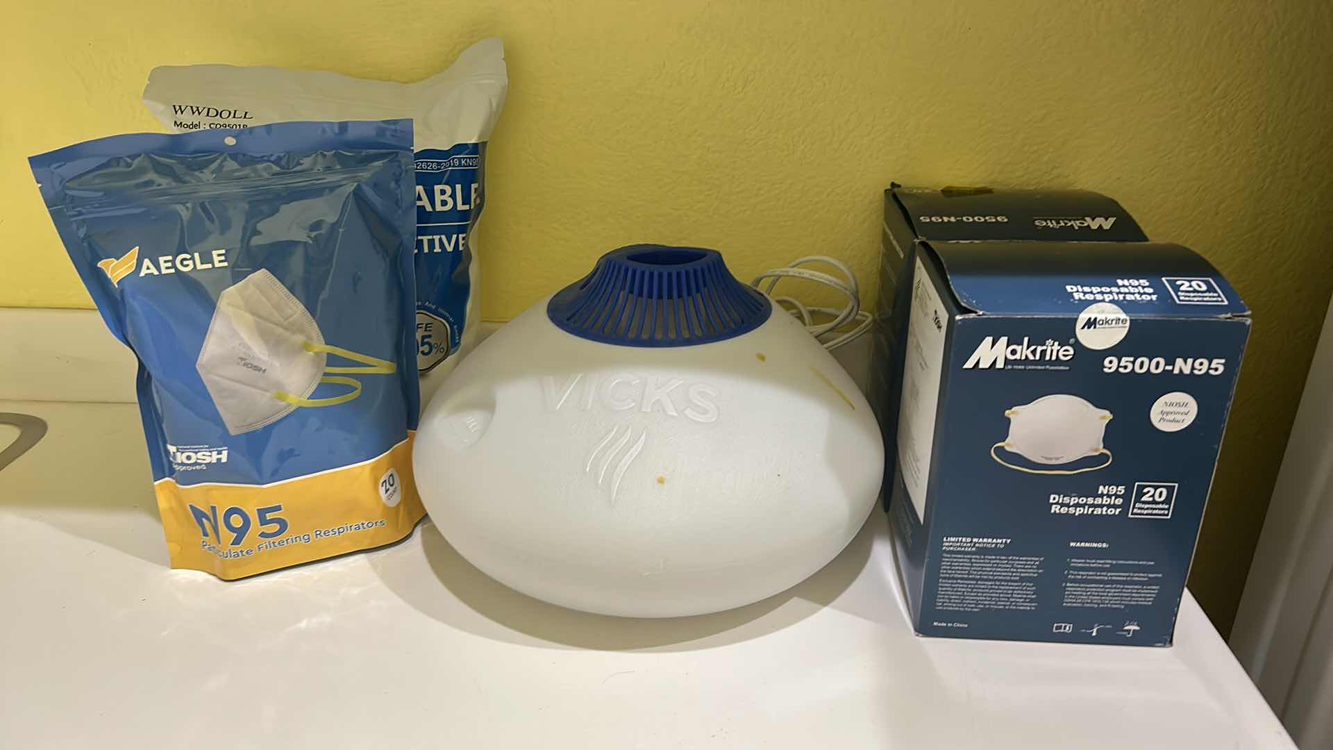 Photo 5 of MEDICAL SUPPLIES - VICKS HUMIDIFIER AND 4 NEW BAGS/BOXES OF N95 MASKS