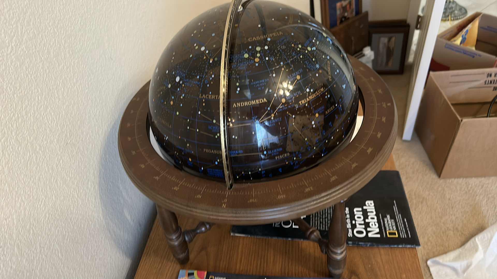 Photo 4 of Glass celestial globe with pamphlets and "Zoo in the sky' book  (globe with base measures 17” x 17”)