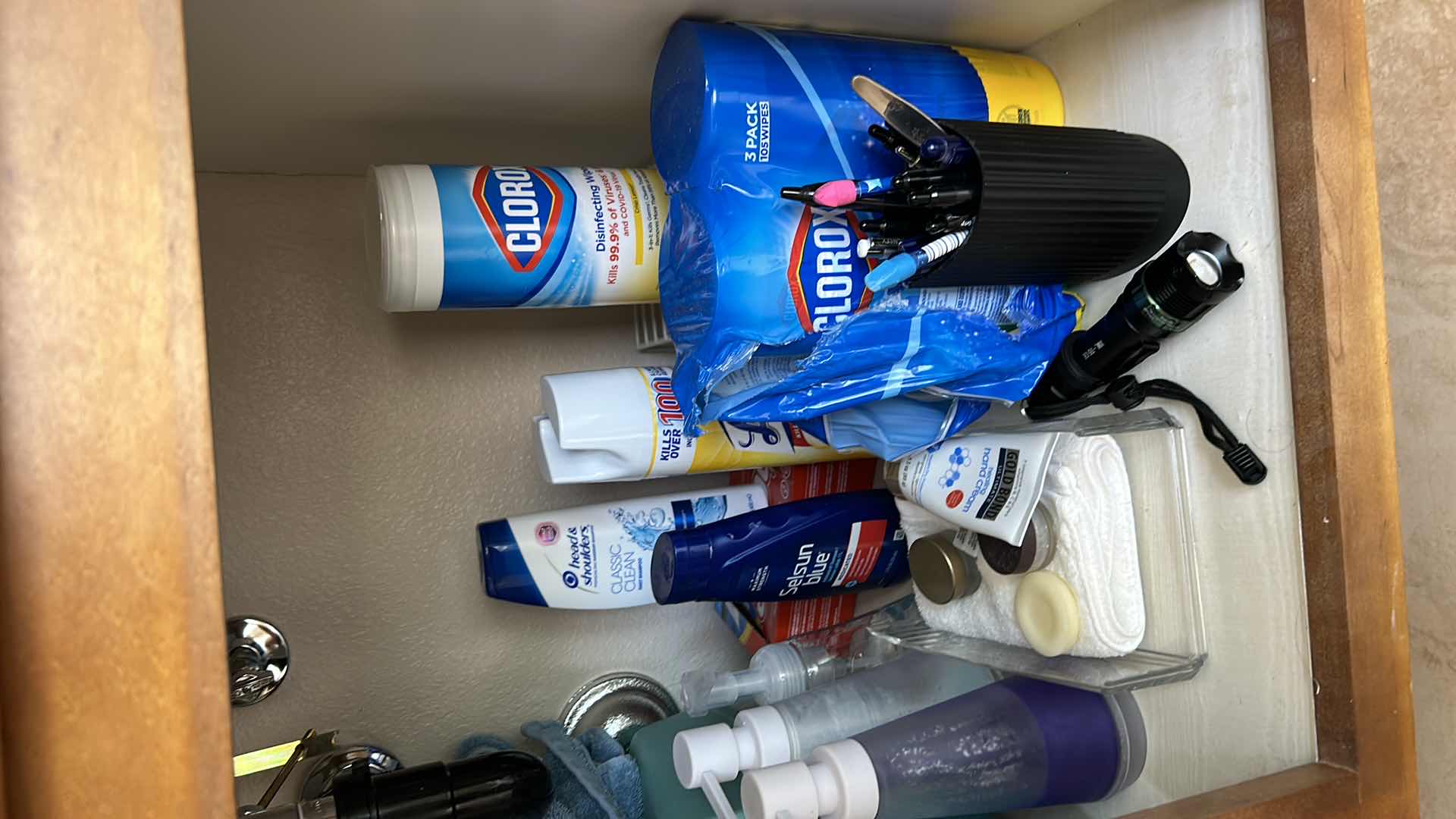 Photo 3 of Contents under sink in bathroom.